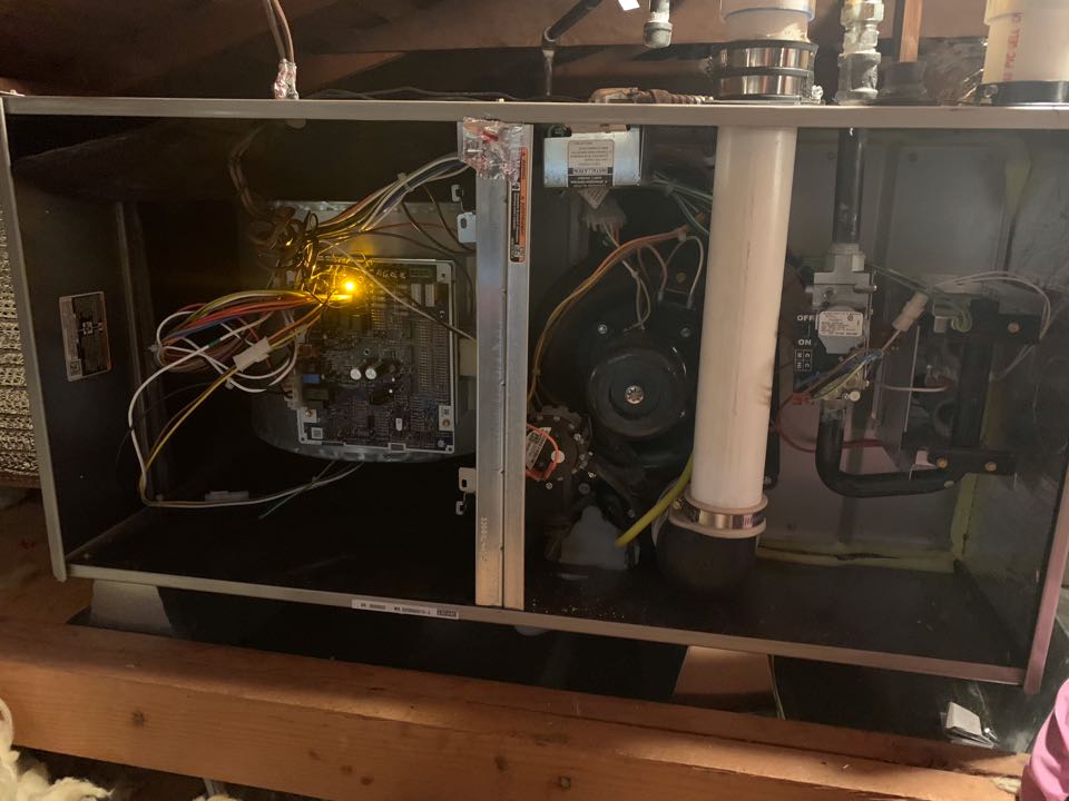 In Clayton, California this afternoon performing a furnace maintenance for the Brtalik residence.