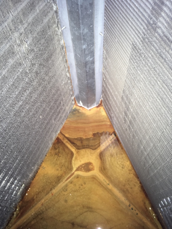 American Canyon, CA - Performing full system precision tune up service on 2000 Goodman system. System runs. Water has been leaking out of coil into pan for some time - there is a lot of rust inside and the water is beginning to leak into the attic. Inspected system and ductwork, tested refrigerant levels and static pressure, cleaned system and made repair recommendations to keep system running. Returning to go over replacement options as clients are looking for a more efficient system. American Canyon, CA - Performing full system precision tune up service on 2000 Goodman system. System runs. Water has been leaking out of coil into pan for some time - there is a lot of rust inside and the water is beginning to leak into the attic. Inspected system and ductwork, tested refrigerant levels and static pressure, cleaned system and made repair recommendations to keep system running. Returning to go over replacement options as clients are looking for a more efficient system.