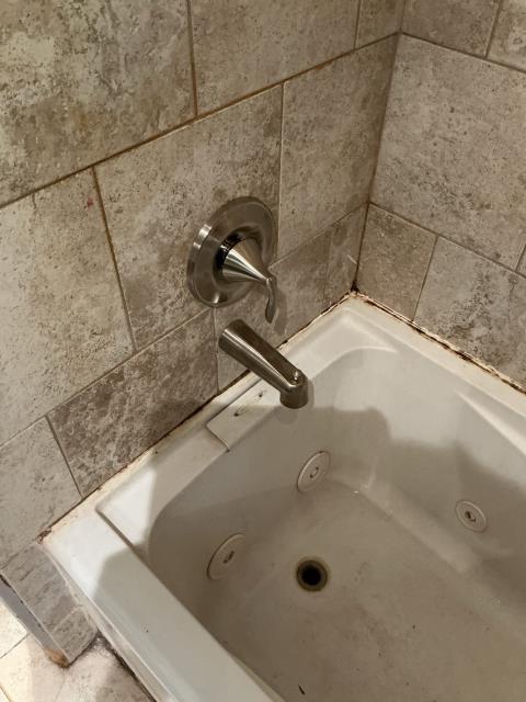 Called out because shower nozzle was stripped to turn water on and control temperature. Installed new tub/shower valve assembly for main floor bathroom. Installed BN Moen Eva trim, access plate to be made in finished wall.