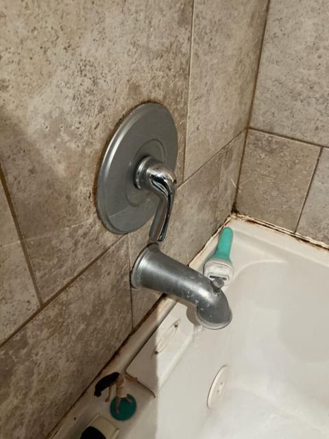 Called out because shower nozzle was stripped to turn water on and control temperature. Installed new tub/shower valve assembly for main floor bathroom. Installed BN Moen Eva trim, access plate to be made in finished wall.