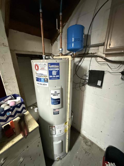 I installed a new 50-gallon electric water heater, including its removal and disposal of the old unit. This involved necessary water piping and electrical wiring. The new heater comes with a three-year labor warranty from Maxwell-White and a six-year parts warranty from Bradford White, void if pressure exceeds 80 psi. I also installed a new three-quarter-inch pressure reducing valve, removing and disposing of the old piping near the water meter. This ensures the pressure remains below the 80 psi code maximum, extending the life of appliances and fixtures. Additionally, I installed a new main shut-off valve after the water meter, including all necessary piping. I shut off the water at the curb to replace the valves and tested everything to ensure proper function. Both installations come with a one-year labor warranty.