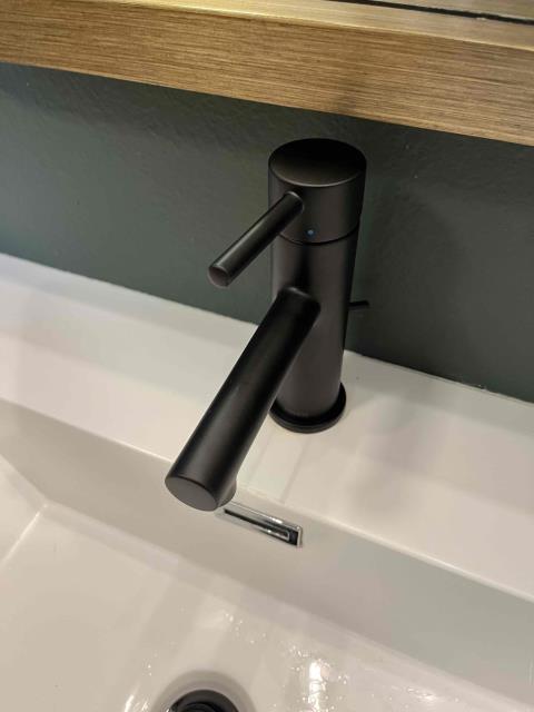 I was called to address several issues in the bathroom. The showerhead was consistently dripping, requiring a new Amcor cartridge to resolve the problem. Additionally, the handheld shower was causing paint to rub off onto the homeowner's hands, which needed immediate attention. The faucet also needed replacement due to wear and tear. Fortunately, all the necessary parts—the Amcor cartridge, the handheld shower, and the faucet—are covered under warranty from Moen and are expected to arrive in about a week. Once the parts are available, I will contact the homeowner to schedule a follow-up visit for the installation.