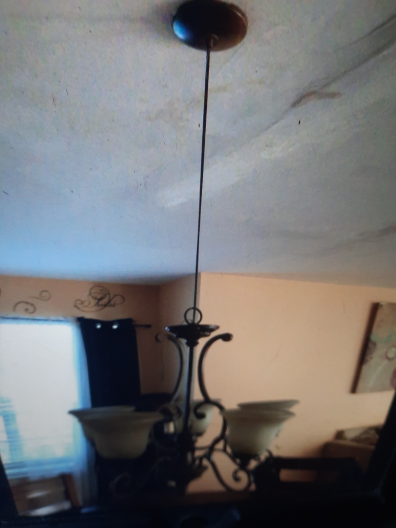 Removed damaged chandelier hanging by wires.
Columbia, MD