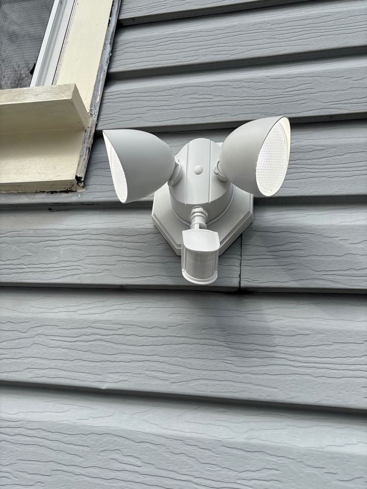 Installed an outdoor motion sensor light in Elkridge, MD.