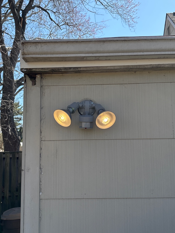 Replaced a motion sensor LED floodlight in Bowie, MD.