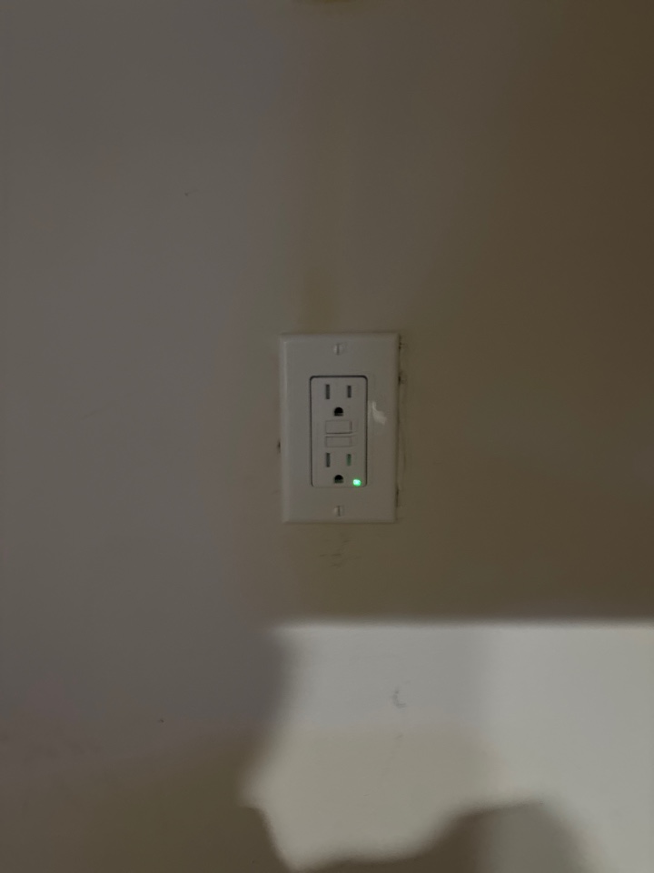 Replaced a standard outlet in a basement with a GFCI receptacle in Severna Park, MD.