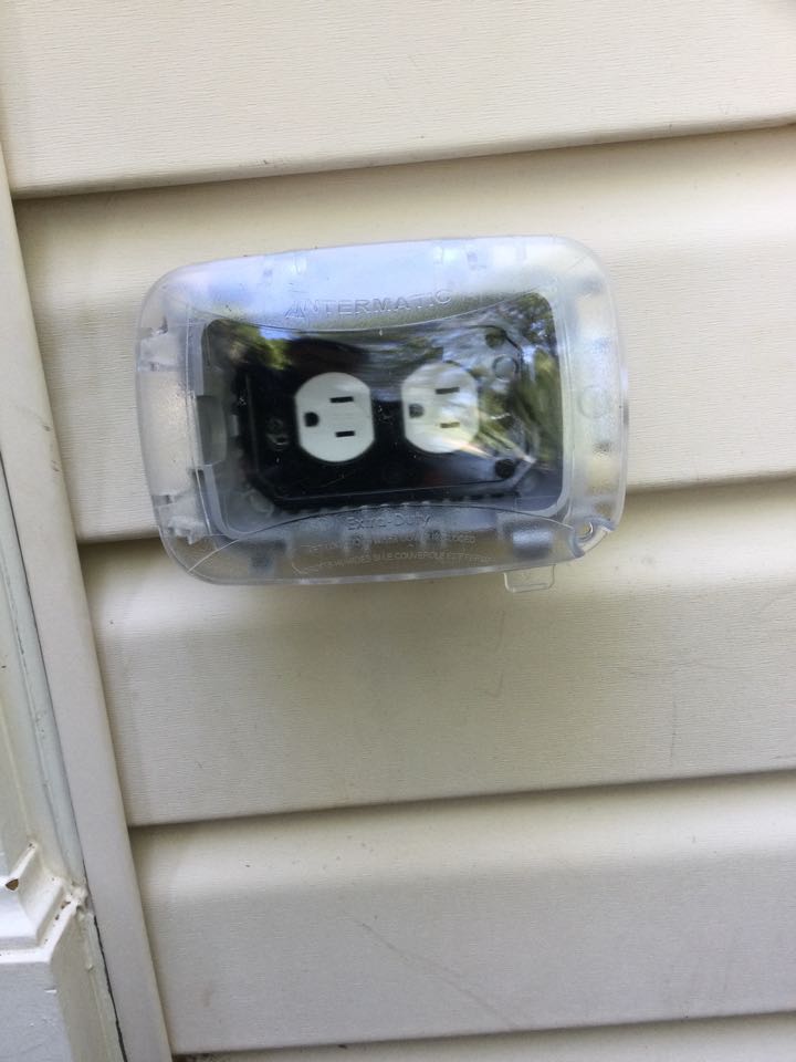 Installed outdoor receptacle and in-use cover in Chestnut Hill Cove, MD