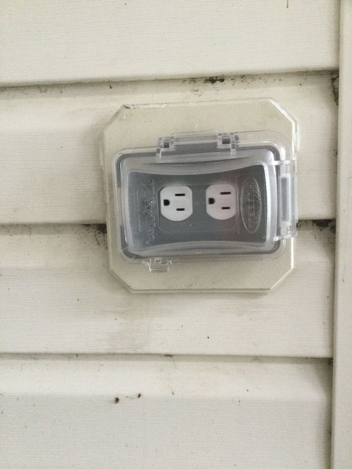 Installed outdoor duplex receptacle and rain-tight in-use cover in Baltimore, MD