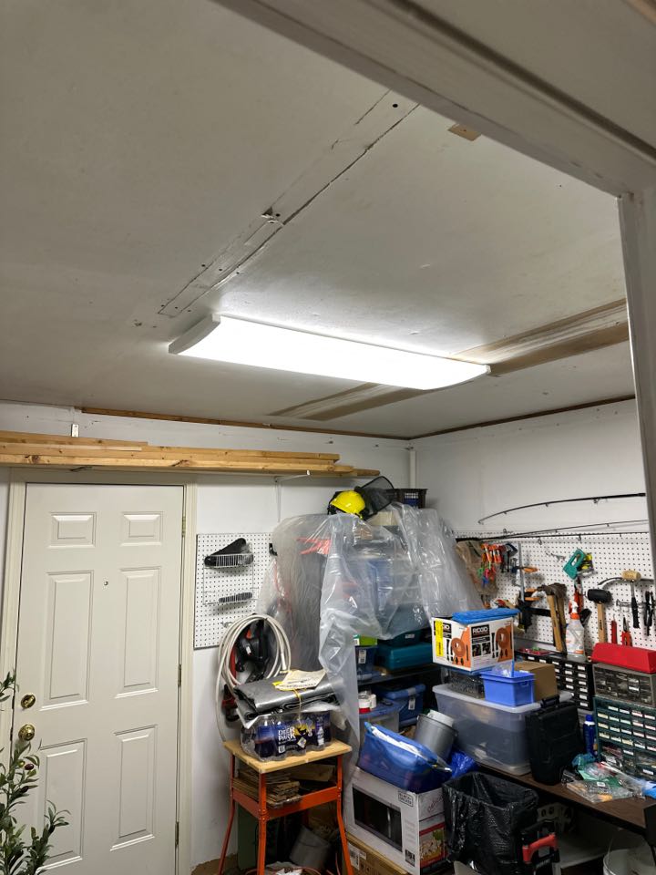 Installed flush mount ceiling light and outdoor duplex receptacle with in-use cover in Pasadena, MD. 