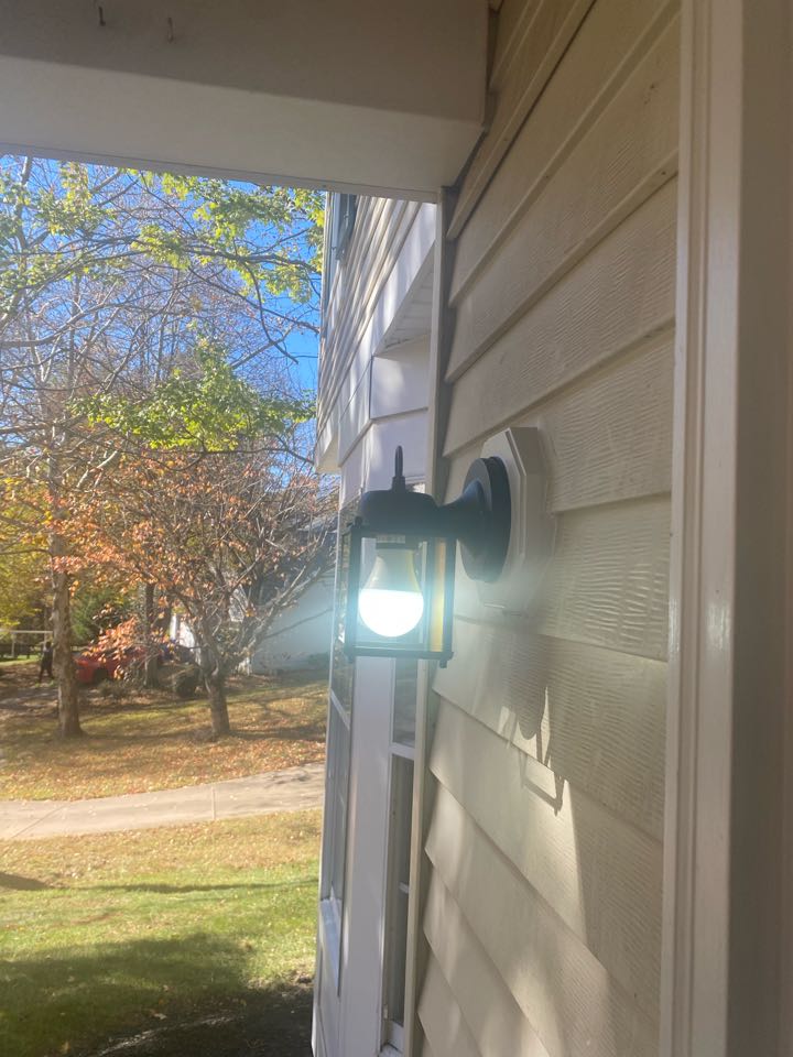 Installed customer supplied outdoor sconce in Columbia, MD