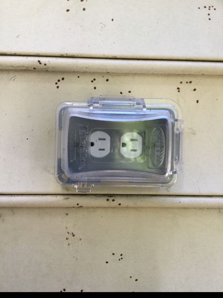 Installed outdoor receptacle and in-use cover in Millersville, MD. 