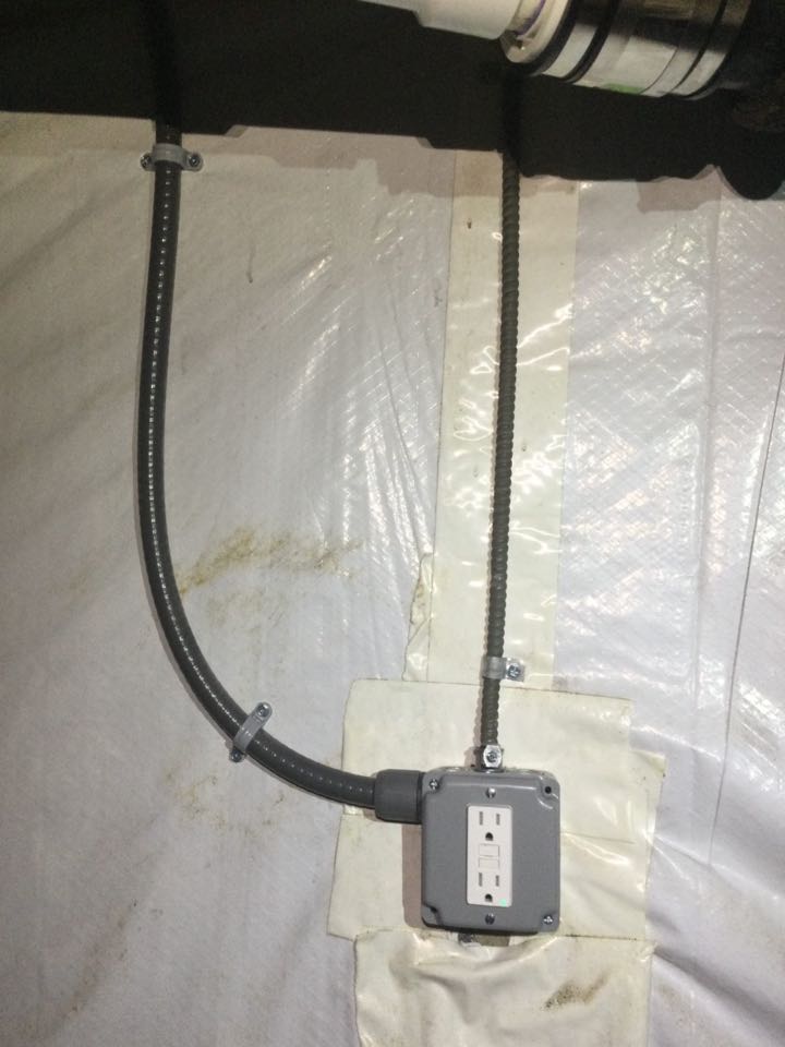 Installed GFCI receptacle and secured/sleeved wires going to it in Halethorpe, MD.