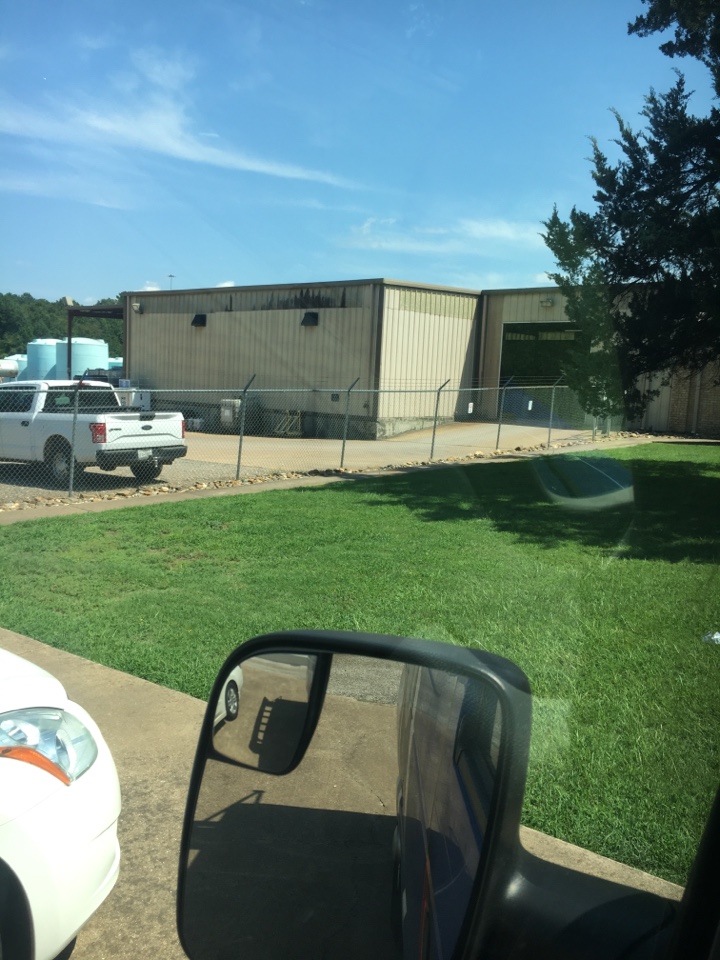 Running a jetter through a manhole to clear it out for a local commercial business in Kilgore, TX.