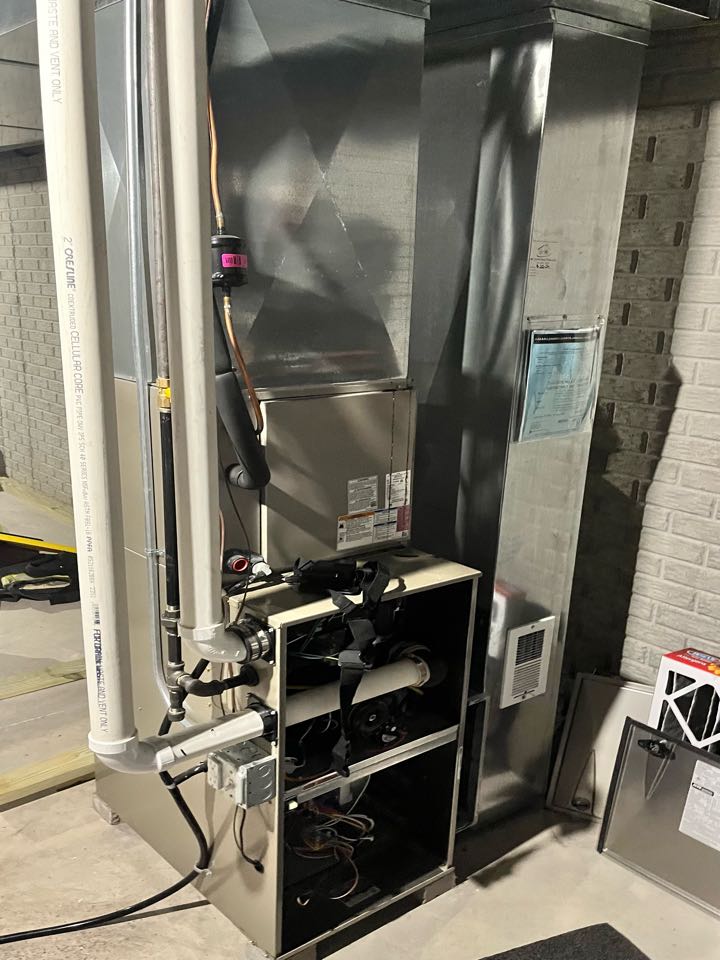 Furnace tuneup in Jackson, WI on a 3 year old carrier single stage furnace with an Ecobee thermostat. Some construction dust all through the ducts, furnace and AC coil above the furnace. 