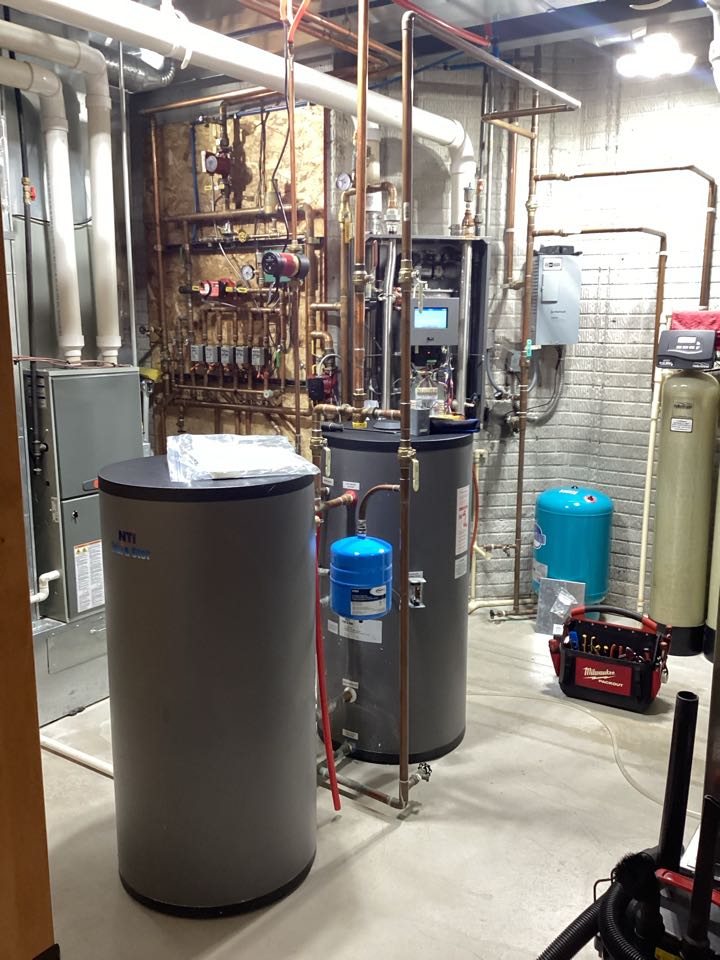 Boiler inspection water pressure adjusted. NTI boiler. Hubertus, Wisconsin.