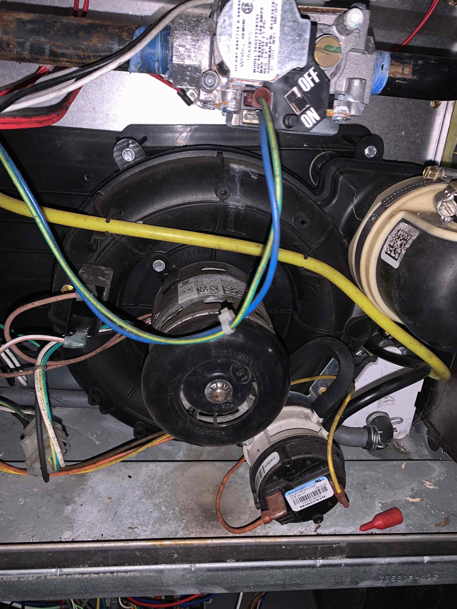 The customer reported that the heat was not working and was throwing a pressure switch code. Upon arrival, I turned on the heat and the inducer motor tried to run but did not spin. I diagnosed the issue as a shot inducer motor bearing. I put in a parts order form for a new motor.