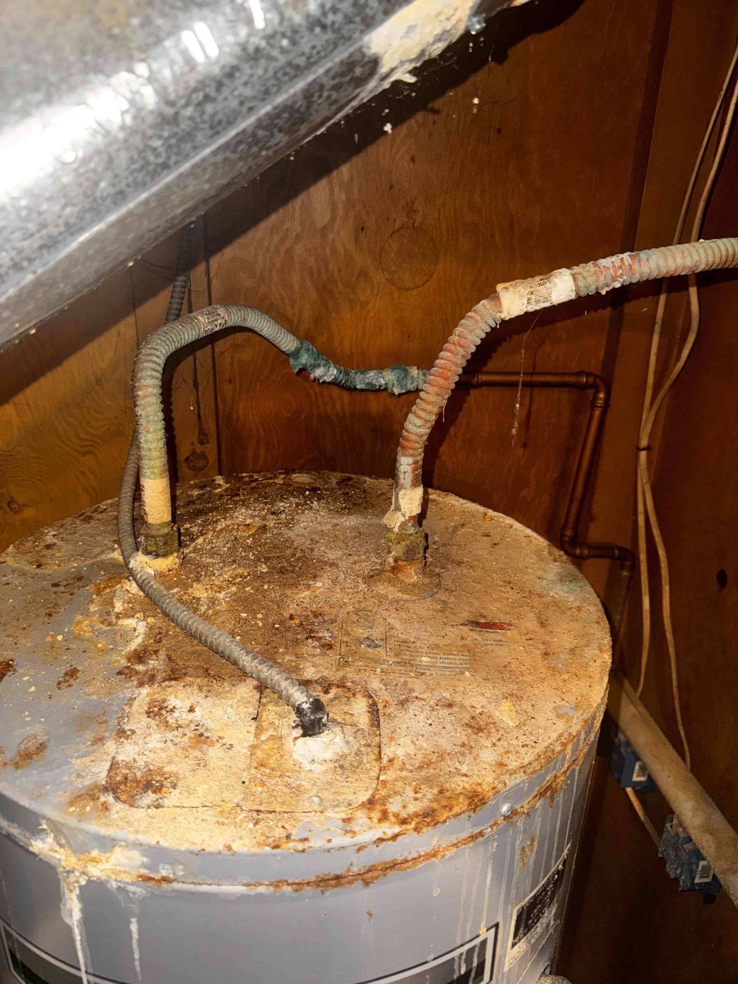 I am a home service technician, and I recently completed a job at a client's home. Upon inspection, I noticed that the venting system was leaking onto the water heater, causing corrosion. The water heater itself was also compromised, but this was further exacerbated by the leaking venting system. I provided an estimate for a replacement water heater and discussed the possibility of reventing the system with the landlord. The client was interested in reventing the system, so I will be contacting the HVAC company to schedule an appointment.