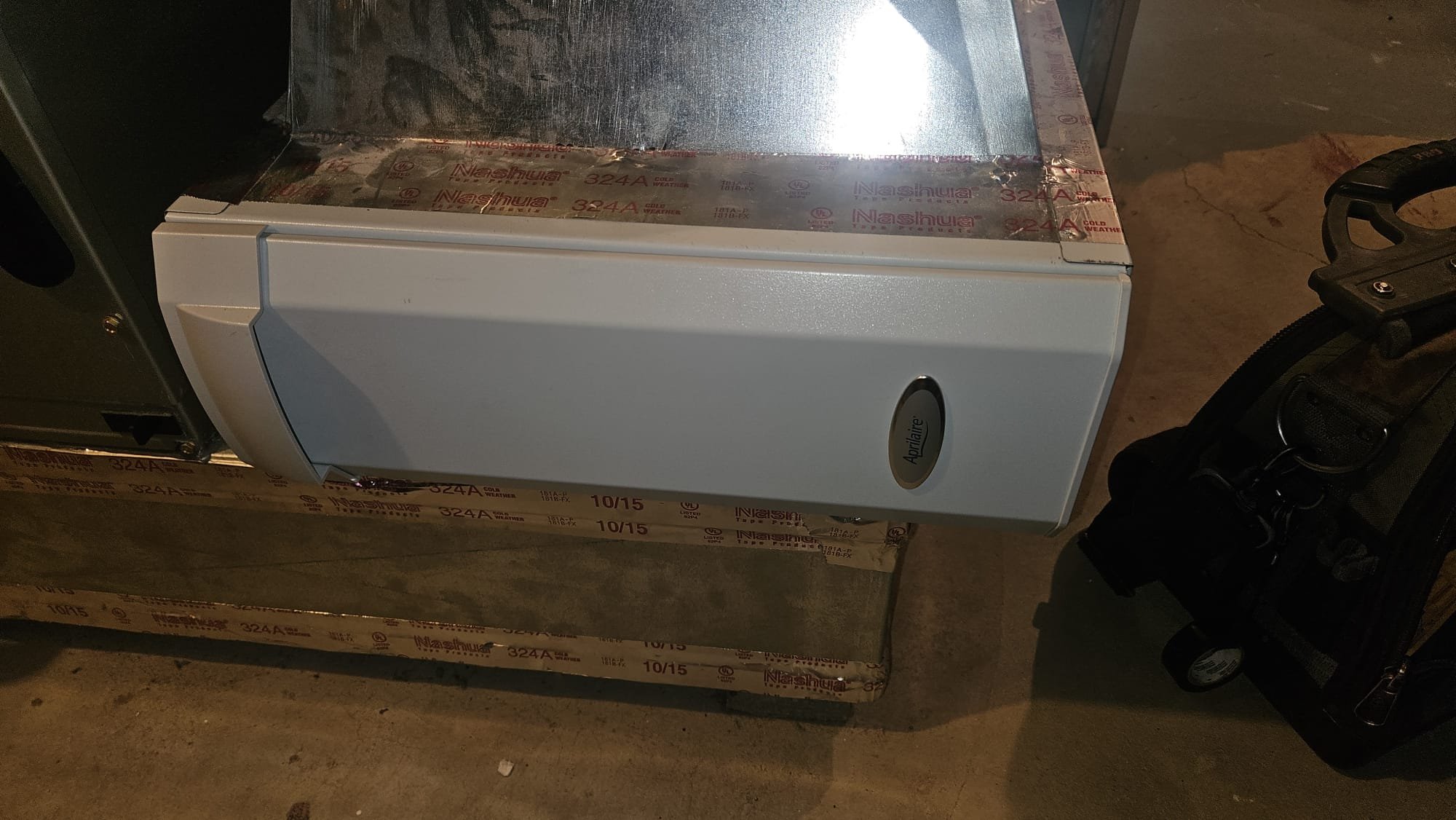 I was called to a customer's home to check on a low refrigerant charge in their air conditioner. Upon arrival, I found that the system was low on refrigerant. I topped off the charge and tested the system for any other issues, but found none. The customer decided to wait before doing a dye test to determine the exact location of the leak.