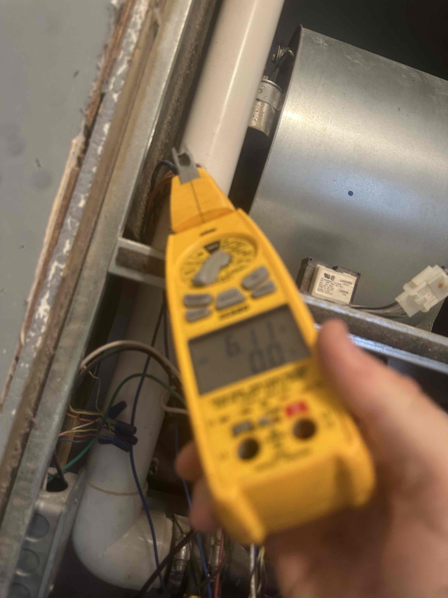 I was called to a home to inspect a furnace that was running good but had a rusted heat exchanger. The heat exchanger is the part of the furnace that transfers heat from the furnace to the air. The heat exchanger is made of metal and can rust over time. It is important to keep the heat exchanger in good condition to prevent carbon monoxide from leaking into the home. I inspected the heat exchanger and found that it was very rusted at the seam. I recommended that the homeowner keep in mind the condition of the heat exchanger and consider replacing it if necessary.