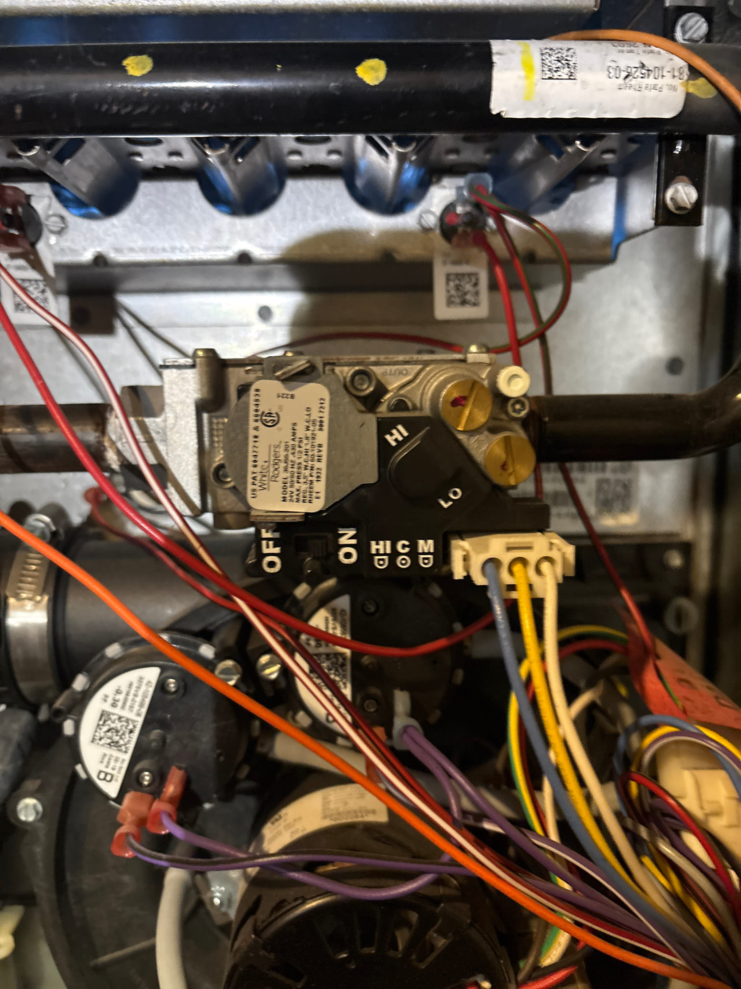 I arrived at the customer's home and found that the unit was not working properly. I ran the unit in heat and found that there was water inside the purge blower. I emptied the water and cleared the drains. I ran the unit in heat again and the unit was working properly.