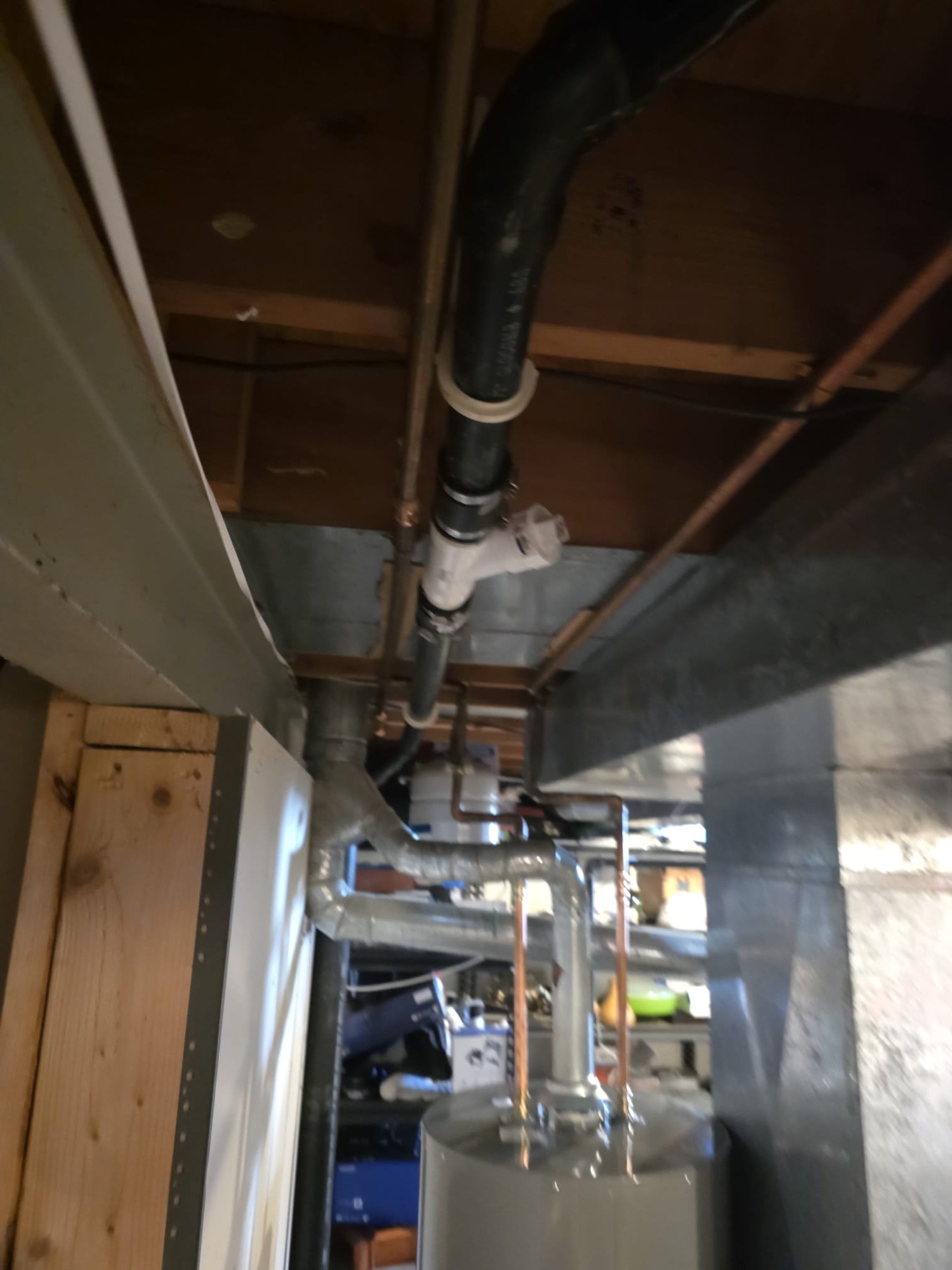 I was called to a home to replace a 40-gallon natural gas water heater that was 20 years old. The client wanted to know how much it would cost to replace the water heater. I noticed some corrosion on the hot outlet side of the water heater. It appeared to be going on for a while. The client had an expansion tank above the water heater and a pan that was drained to the floor drain.