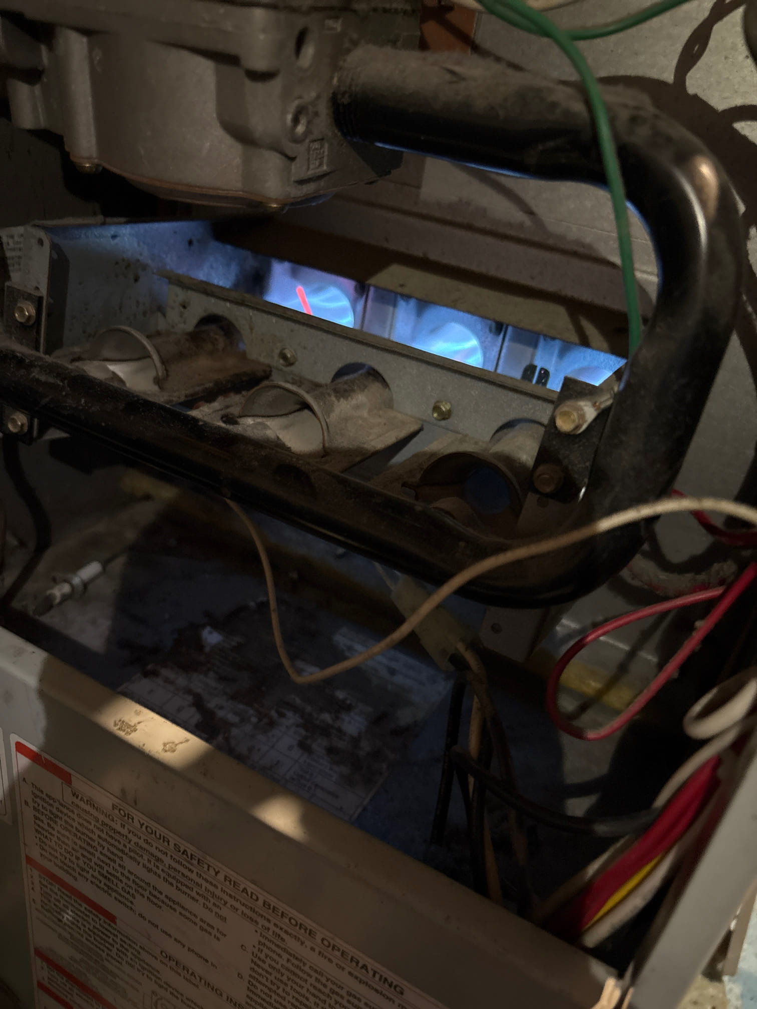 I arrived at the customer's home to find a transformer with 120 volts coming in but no power going out. I replaced the transformer and found a bear wire in the thermostat's wiring. I cut the bad part out of the thermostat, rewired it, and ran the unit, blower, and inducer motor. The blower and inducer motor sounded like the bearings were going out, so I informed the customer that the unit was running in heat.