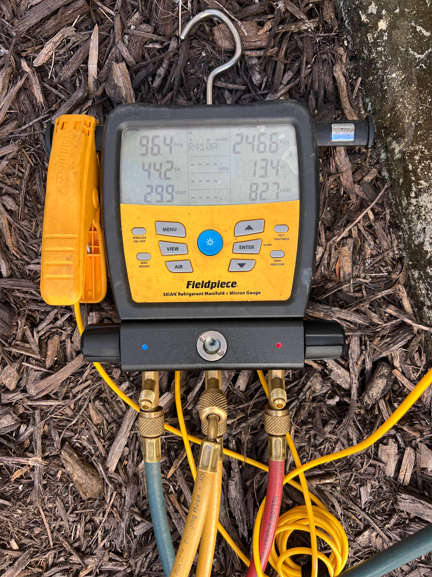 I checked the air conditioner and air handler, and the pressures are good for 62 degrees outside. I fixed the armaflex and strapped up the line set so it would not be resting on the metal trusses. Everything is ok.