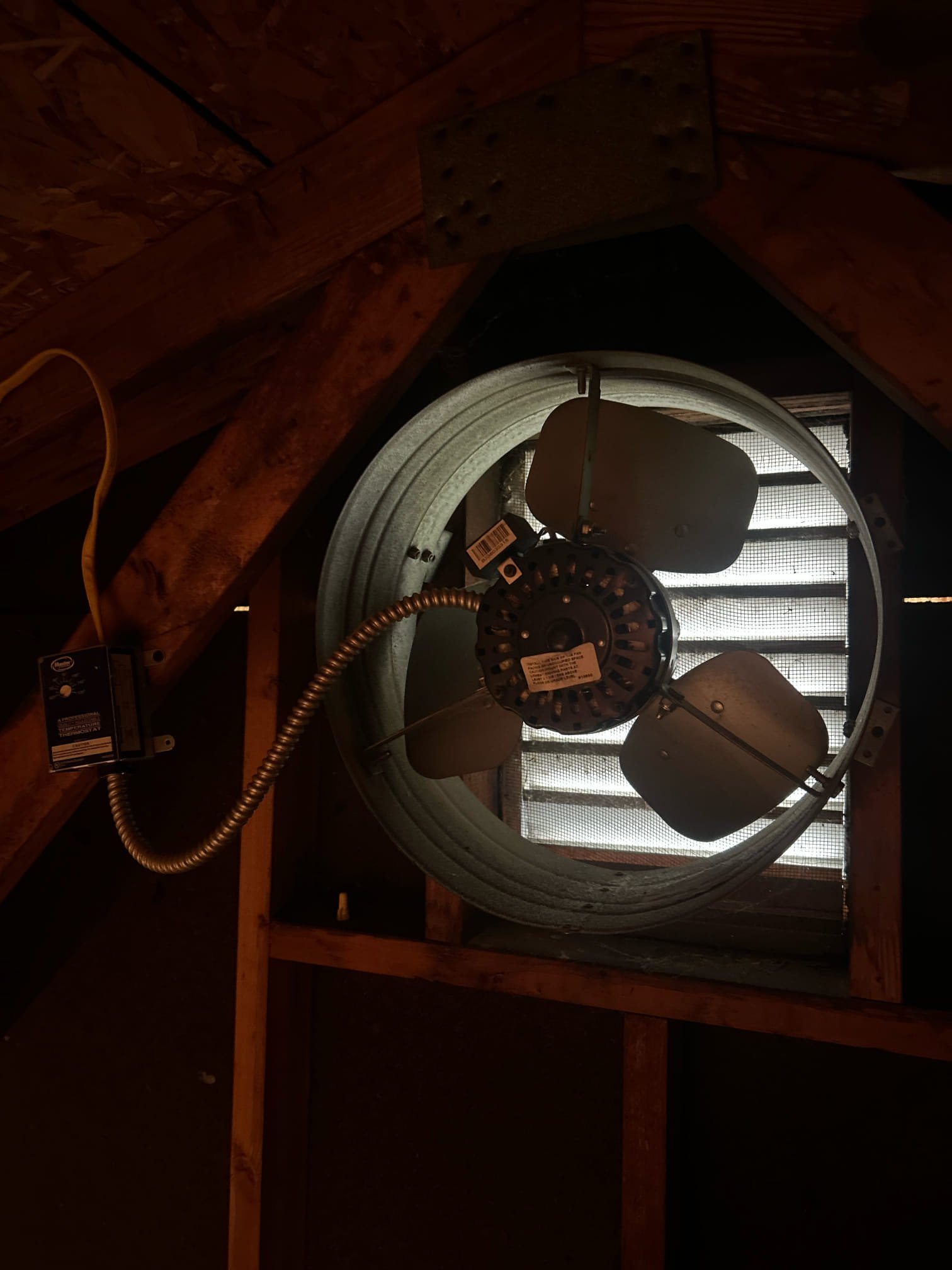 The customer is currently comparing quotes for a home service project. The project includes the installation of a new attic fan and venting of a bath and range hood outside the house. The customer is considering the cost of the labor and materials for the project.