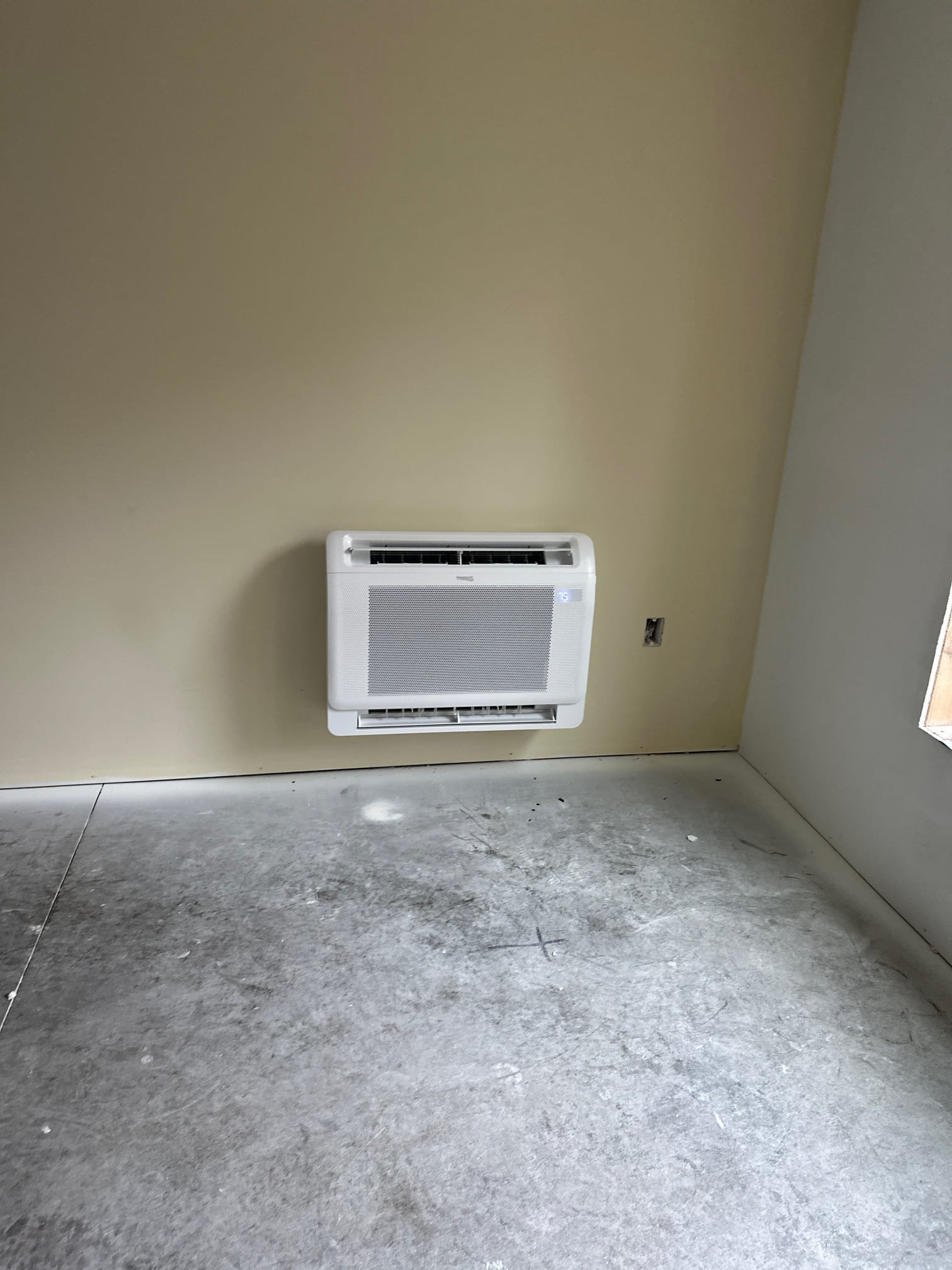 I was hired to install a mini split system in a residential home. The system was installed in the living room and consisted of an indoor unit and an outdoor unit. The indoor unit was mounted on the wall and connected to the outdoor unit via a refrigerant line. The outdoor unit was mounted on the roof and connected to the indoor unit via a power cable. The system was installed by connecting the refrigerant line, power cable, and drain line. The system was tested to ensure that it was operating properly before being turned on.
