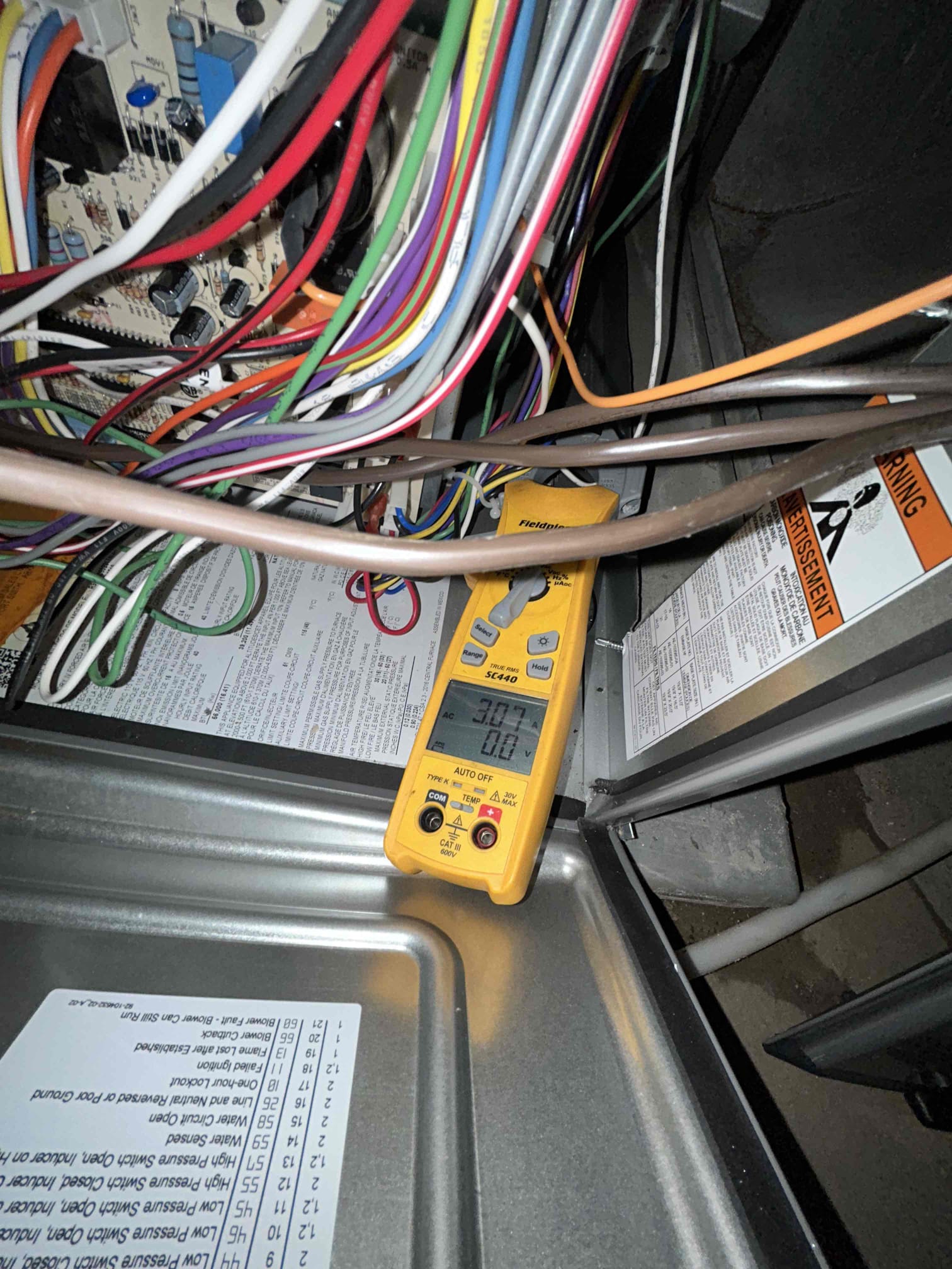 I am a highly skilled home service professional who recently completed a furnace inspection at a client's home. During the inspection, I noticed that the air filter needed to be changed. I checked the air filter and found that it was 16 X 25 X 1. I also noticed that the system had thrown a water circuit open code, but it did not affect the operation of the unit. I cleaned off the flame sensor and verified that the amperage was good. The client stated that they would change out the air filter on their own.