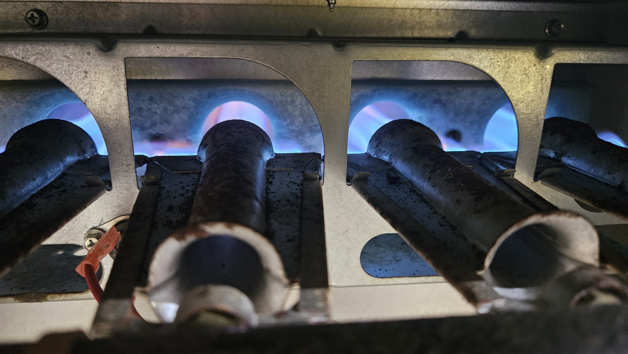 The furnace had a lot of corrosion in the cabinet from mice. The burners were also corroded, affecting the flame spread on ignition. I recommended replacing the furnace due to the overall condition and having the ductwork cleaned.