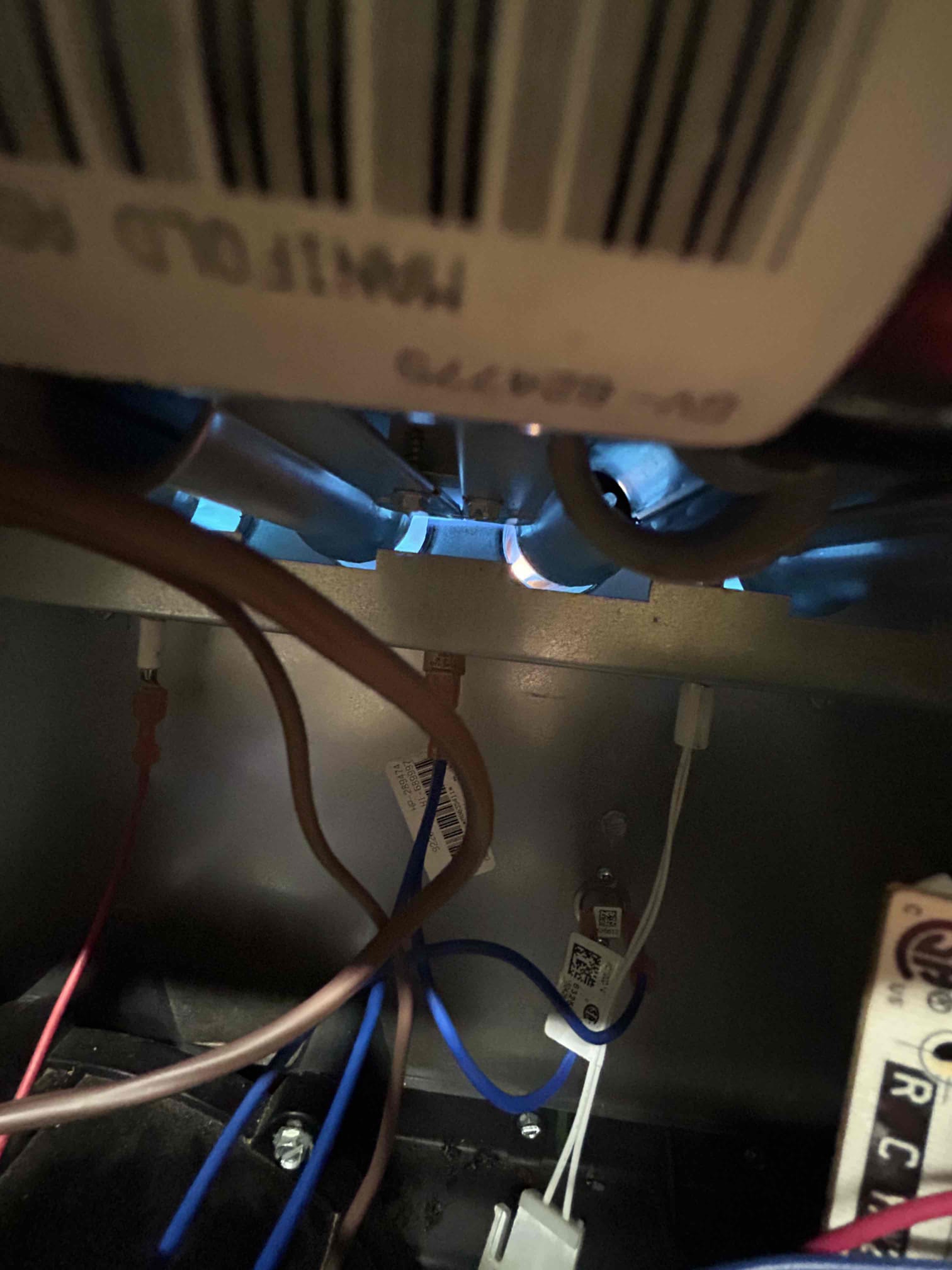 I was called to a home in the suburbs of Chicago to repair a gas valve that had been intermittently failing. Upon arrival, I found that the gas valve diaphragm had failed and was causing the flames to roll out. I reset the switch and tried to adjust the gas pressures, but the issue persisted. I recommended replacing the gas valve with a new one to ensure that the client's system would stay up and running.