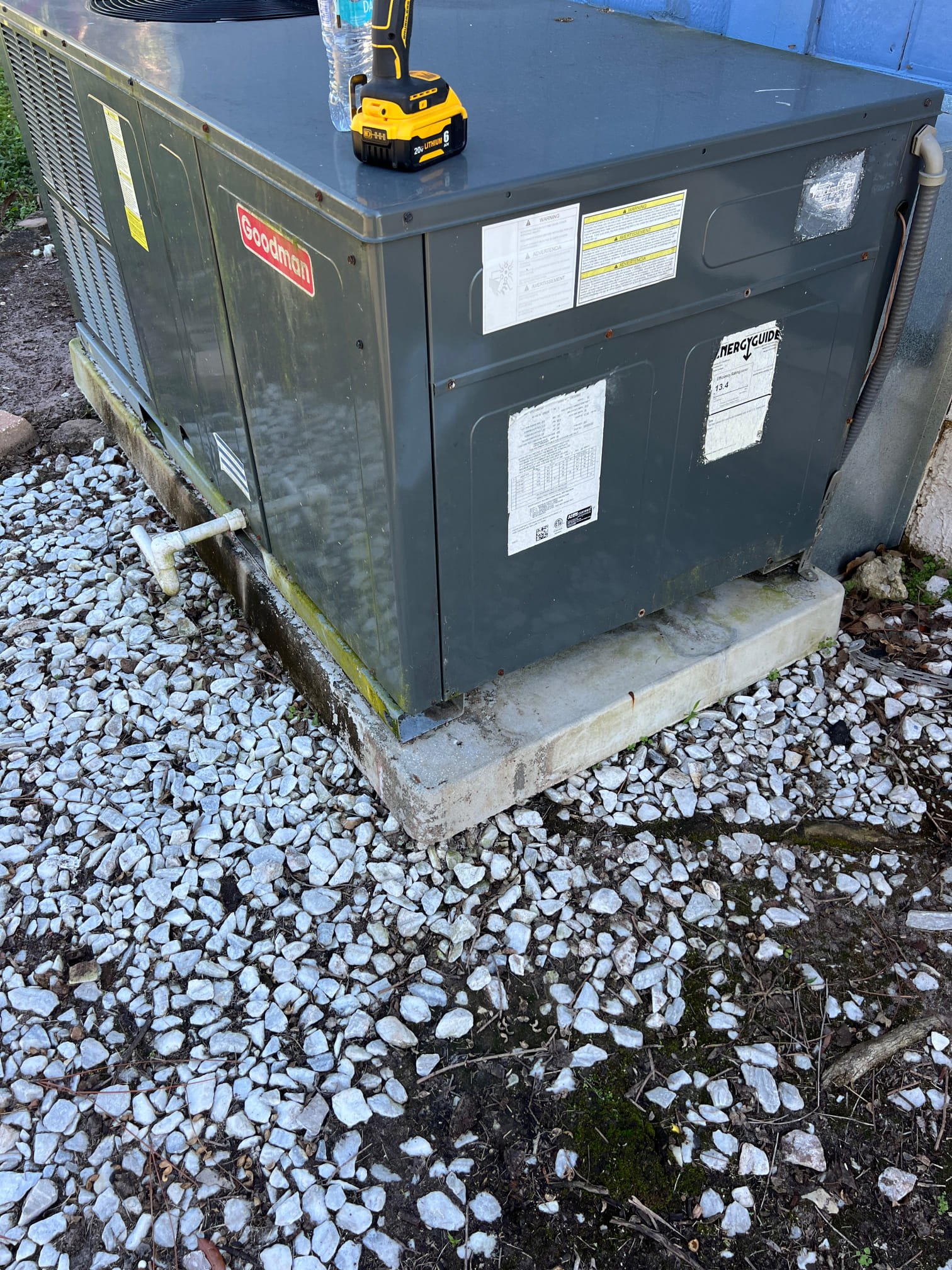 I went through the system and cleaned the drain pan and drain trap again. Inside the unit was damp, but no standing water like before. The system was dry all around and nothing was leaking. There was water in the area where the condenser coil is because the lines are not insulated. I poured bottles of water into the drain pan and let it drain. The drain pan did not overflow. The system is cooling correctly.