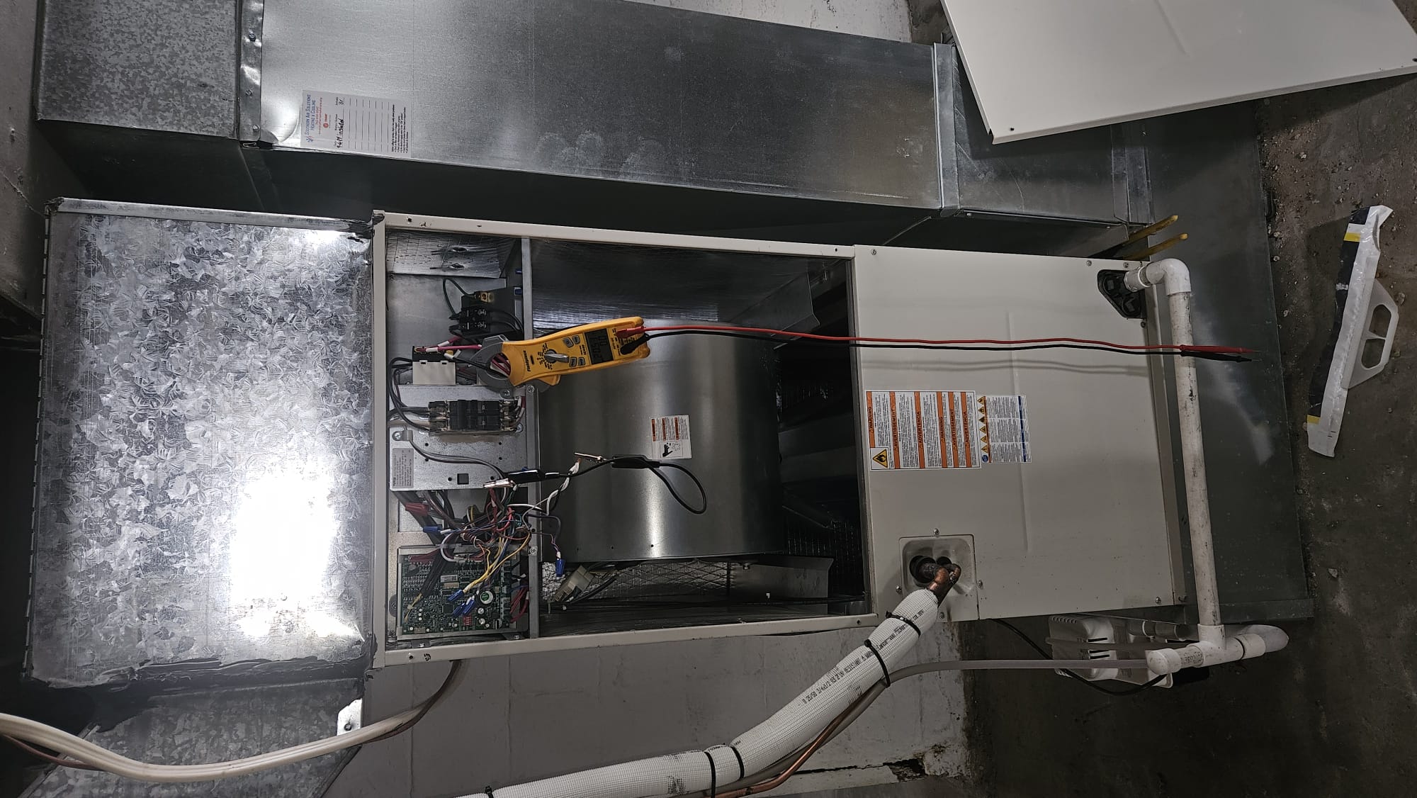 I was called to a home to fix a heating issue. The unit was not wired for aux heat, so I wired in the heat strips and tested the heating. I found that the heat strips were not working, so I replaced them. After replacing the heat strips, I tested the heating again, and it was working properly.