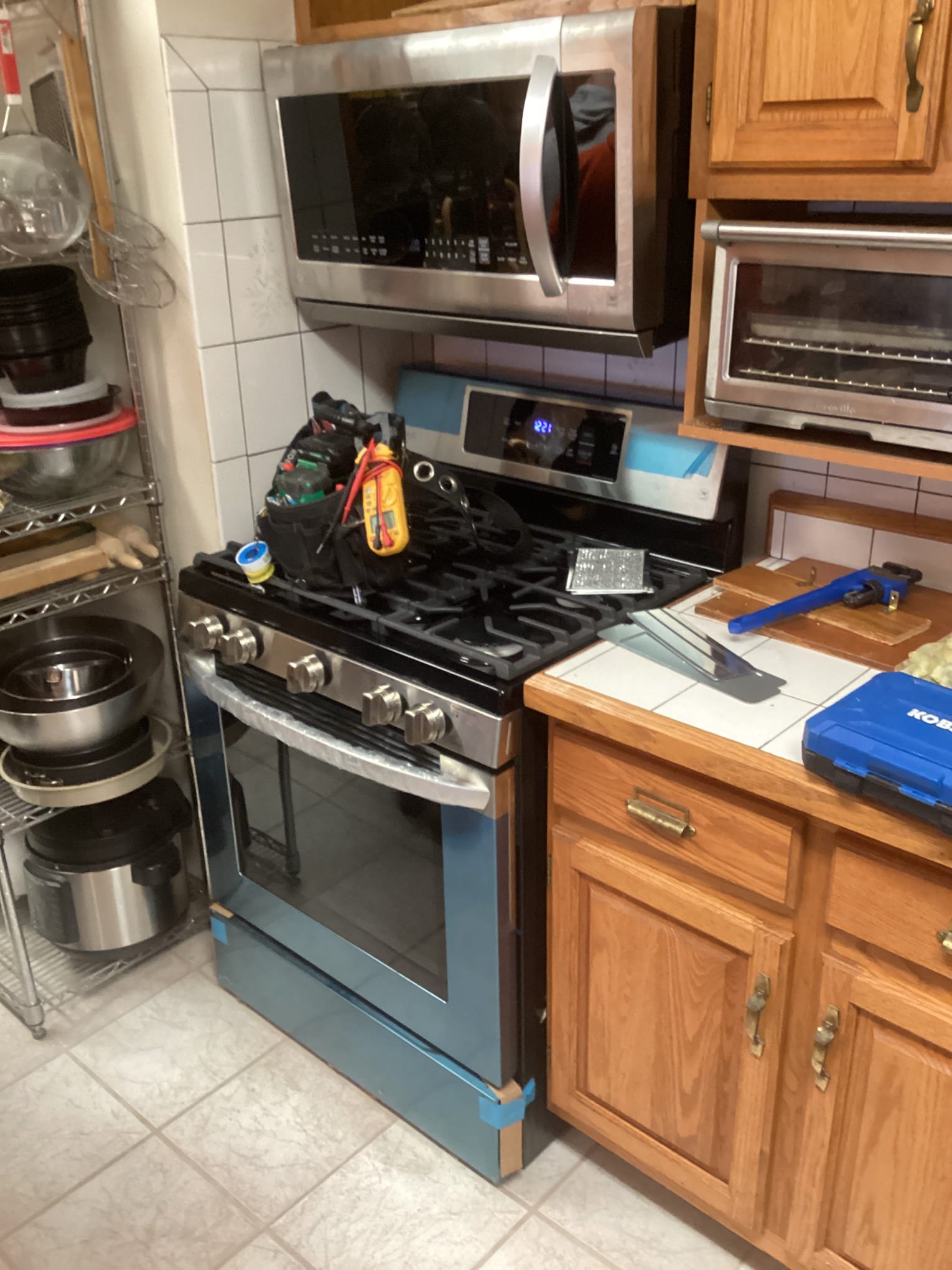 Installed dishwasher, microwave and oven. Converted oven to propane