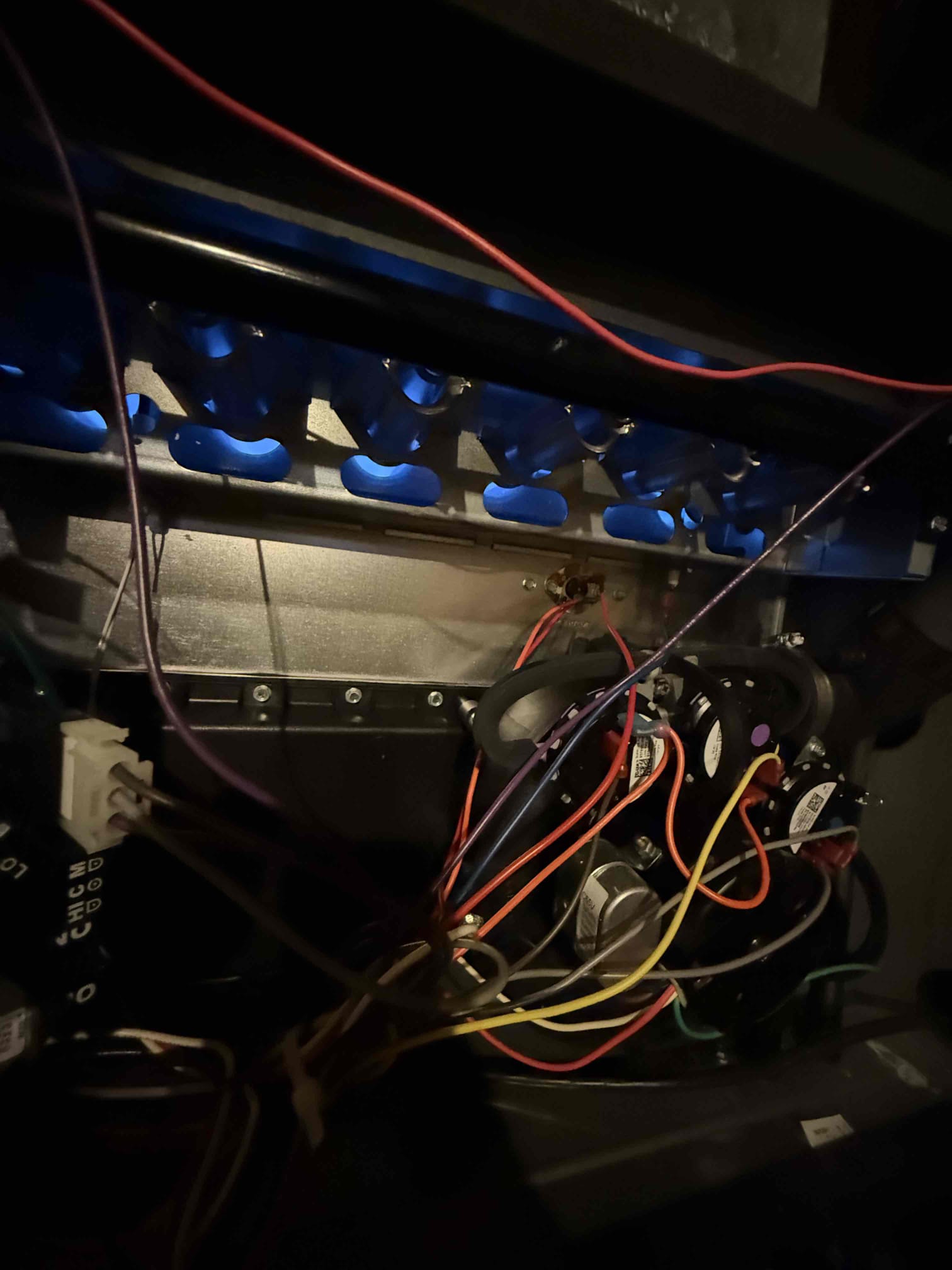 Cleared out plugged drain , unit is now operating 