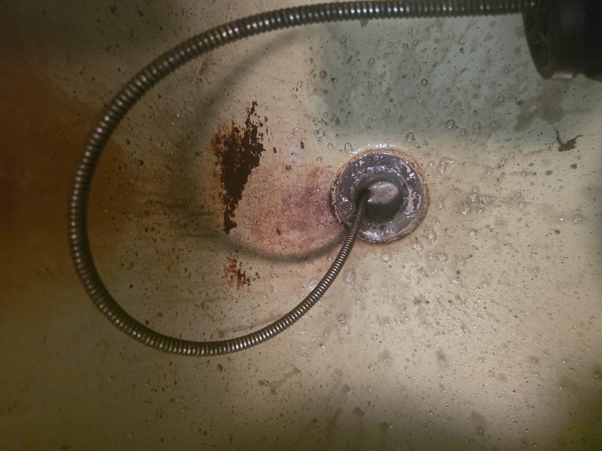 We have successfully snaked the main drain from the tub and cleared the clog. However, we were unable to conduct thorough testing due to the absence of water within the home. The existing water supply is located in a pump house, which is currently frozen. Please note that drain cleaning services are not guaranteed under these circumstances.