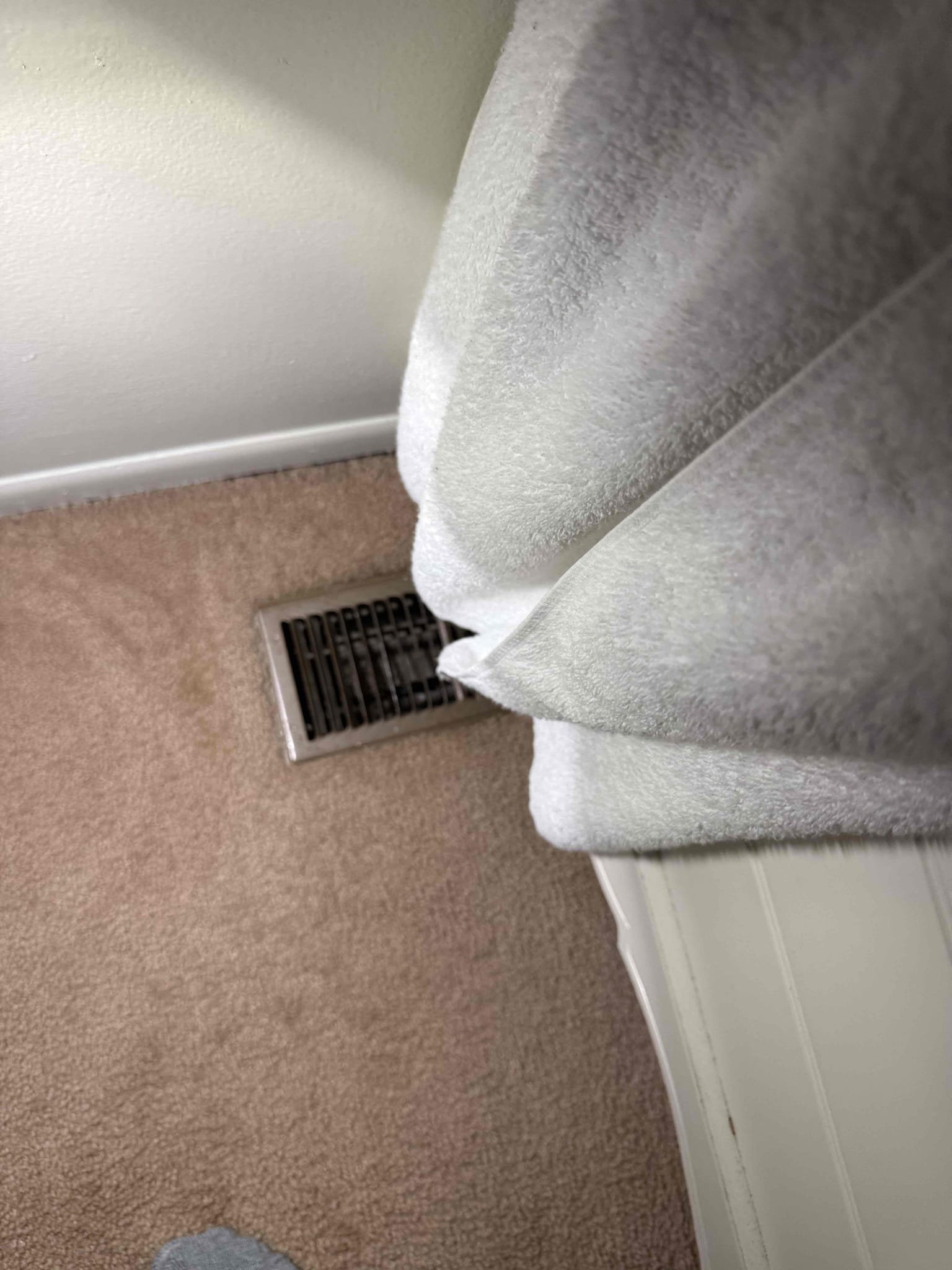 The bed is covering 90 percent of the vent. Talked with Leah and she is going to get a directional cover for register to reflect heat out from under bed