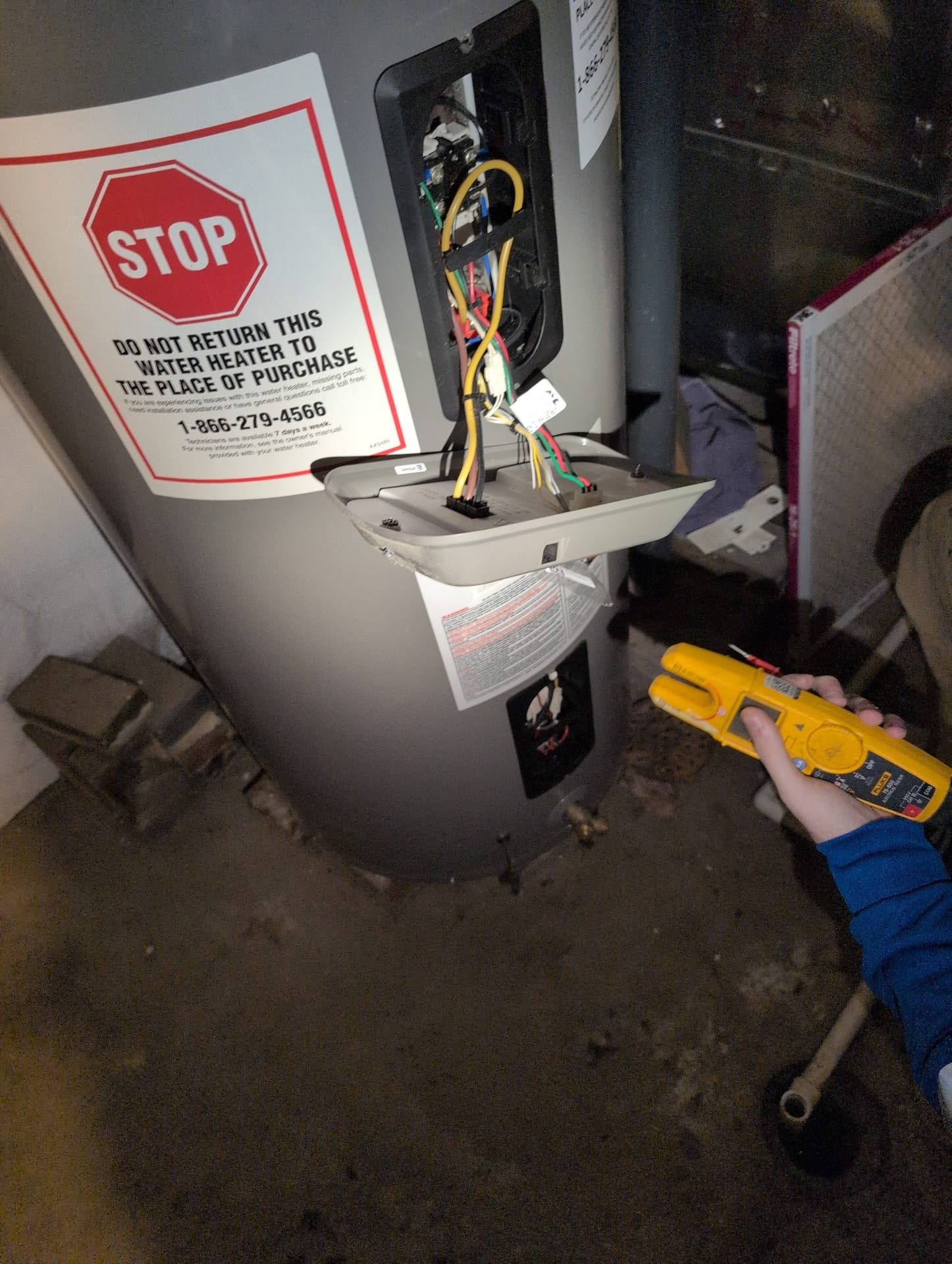 * client had us out for an inspection of their water heater. 
* Water heater is from 2018 little on the older side. However it is working fine. 
* We do see evidence at the top where the wire nuts come in at it a little bit of soot. Showing a possible issue that happened. 
* We tested the elements upper and lower. Both read at 11. 
* We tested the thermostat as well. It was getting good voltage and had continuity running through it. 
* The only issue we had was the age of the water heater. Client stated that it was smoking at one point. Currently. As it stands now, we did not see any smoking. Did not smell any burning water heater is working properly but it did flip the breaker. 
* For safety we gave an estimate to replace it.