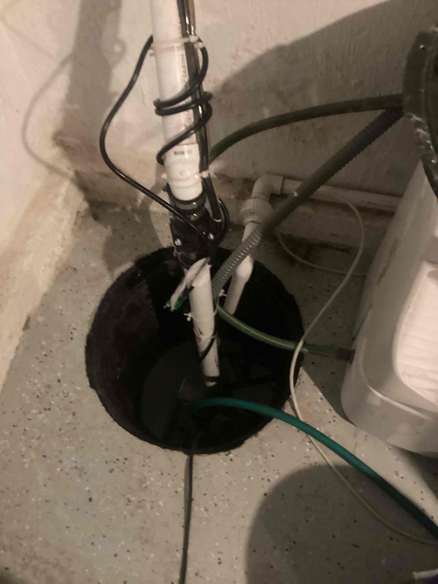 Replaced sump pump with Zoeller M53 and cut out and replaced drain line outside with proper pipe fittings and hangers.