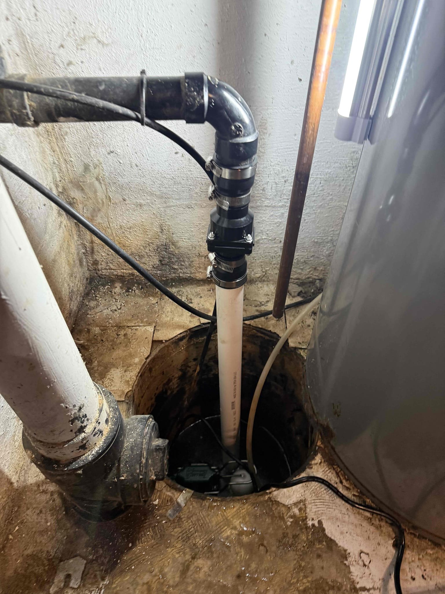 This price covers the change out of a sump pump and check valve 