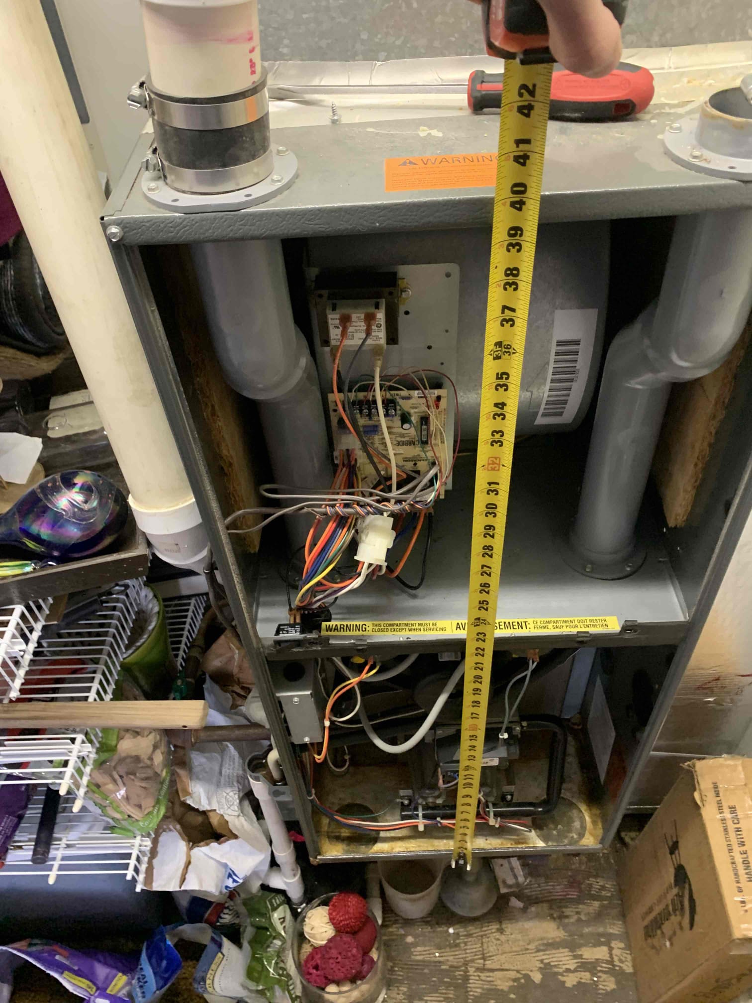 Unit not heating. Found unit to be tripped out on pressure switch fault. Checked exhaust pipe and found that to be clear. Upon further inspection inducer motor was running extremely loud and leaking water from back plate. Someone from different company put tape an system to stop water from leaking on burner assembly and had it dripping onto bottom of furnace as seen in pictures. Talked with customer and let her know that based of age and the condition of furnace the best option would be replacing system. Customer signed estimate and furnace is set for install tomorrow. 