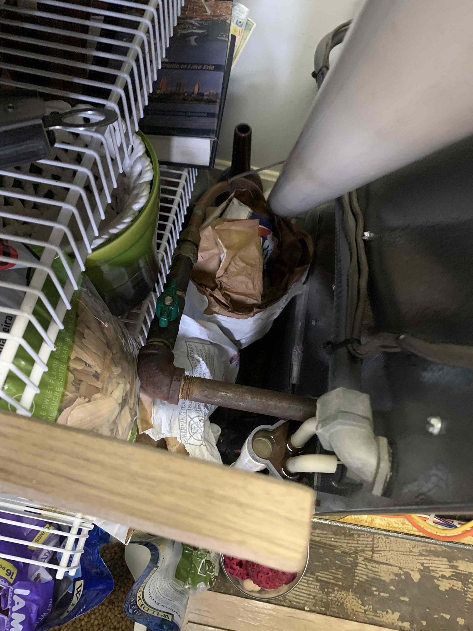 Unit not heating. Found unit to be tripped out on pressure switch fault. Checked exhaust pipe and found that to be clear. Upon further inspection inducer motor was running extremely loud and leaking water from back plate. Someone from different company put tape an system to stop water from leaking on burner assembly and had it dripping onto bottom of furnace as seen in pictures. Talked with customer and let her know that based of age and the condition of furnace the best option would be replacing system. Customer signed estimate and furnace is set for install tomorrow. 