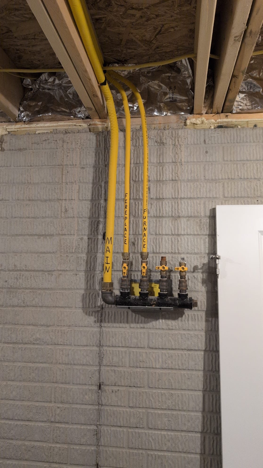 Today, I was called to address an issue with a Bradford White 50-gallon electric water heater installed in 2018. Upon inspection, the water heater appeared to be in excellent condition, which is typical for this model. I tested both the top and bottom heating elements, which showed a resistance of 13 ohms, indicating they are functioning correctly. Additionally, I checked the top and bottom thermostats for continuity, confirming they are operational. Although there was a slight possibility of a crack in one of the thermostats, it was likely calcified, which could mask internal issues. Given the water heater's age, I recommended a replacement for better efficiency. I provided estimates for repair, replacement, and a tankless option, which the client expressed interest in. The client decided to consult with their spouse before making a final decision.