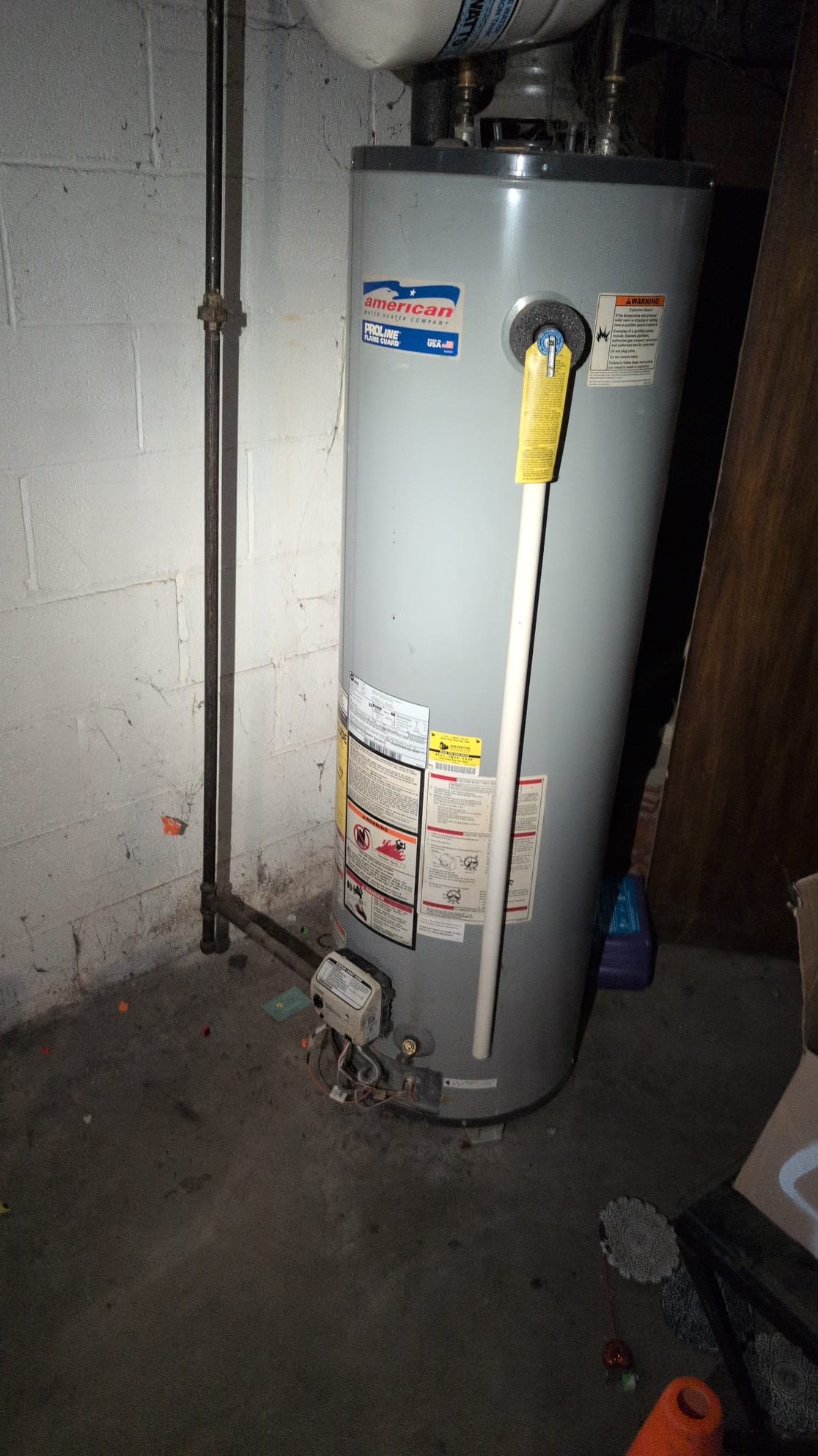 The client contacted us for assistance with their water heater. Upon inspection, we identified several issues with the 40-gallon natural gas tank, which dates back to 2010, placing it well beyond its typical 10-12 year lifespan. The expansion tank was leaning, and upon closer examination, water leakage indicated a failed bladder. Additionally, the igniter button was extremely sticky, and no spark was visible when attempting to ignite the heater. The exhaust appeared to vent through a chimney, but we needed to confirm if it was lined, as an unlined chimney would not be suitable for our use. We provided a quote for a replacement water heater, emphasizing the necessity of a lined chimney. We also offered a quote for a tankless water heater, which would be conveniently installed near the current heater, benefiting from an ideal up-and-out vent exhaust scenario, nearby water lines, and gas lines directly above. The client plans to discuss the options with their partner before proceeding.