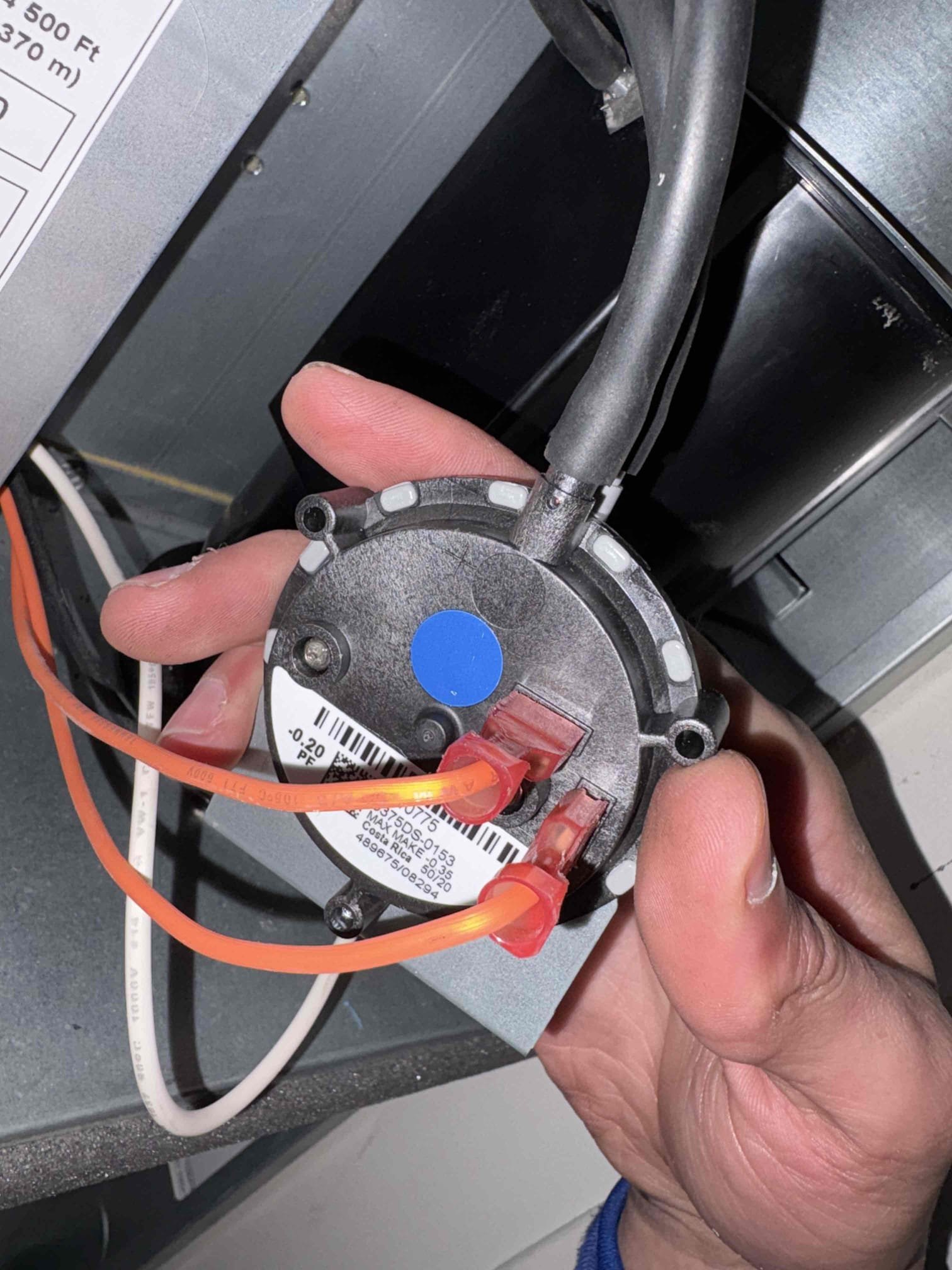 Trevon Showman reported an issue with the unit not running after replacing the pressure switch. Upon inspection, no 24 volts were reaching any safety switches. Continuity tests confirmed the switches were functional, but the pressure switch was faulty. A new pressure switch was left on the unit. Additionally, the igniter was receiving a constant 120 volts. The unit was turned off, and a parts order was placed for a new circuit board and igniter.