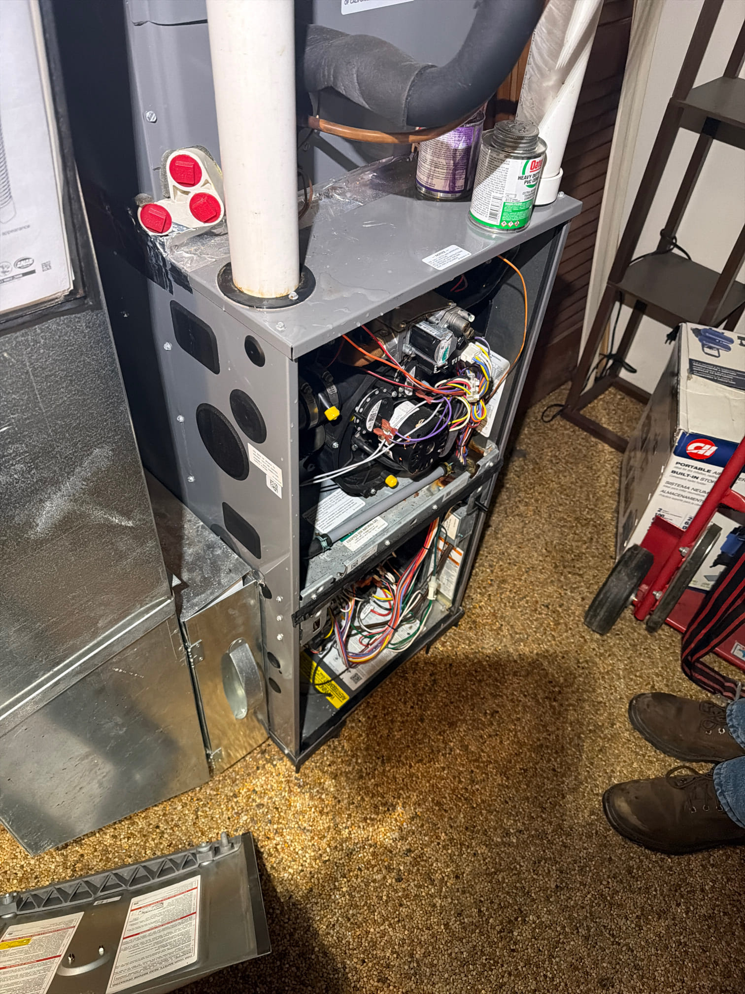 Upon inspection, I discovered that the exhaust pipe was obstructed by ice buildup, and the intake was clogged with snow. I carefully cleared the ice from the exhaust pipe and removed the snow from the intake. After ensuring both pipes were free of obstructions, I tested the system to confirm it was functioning correctly. The system is now operating efficiently.