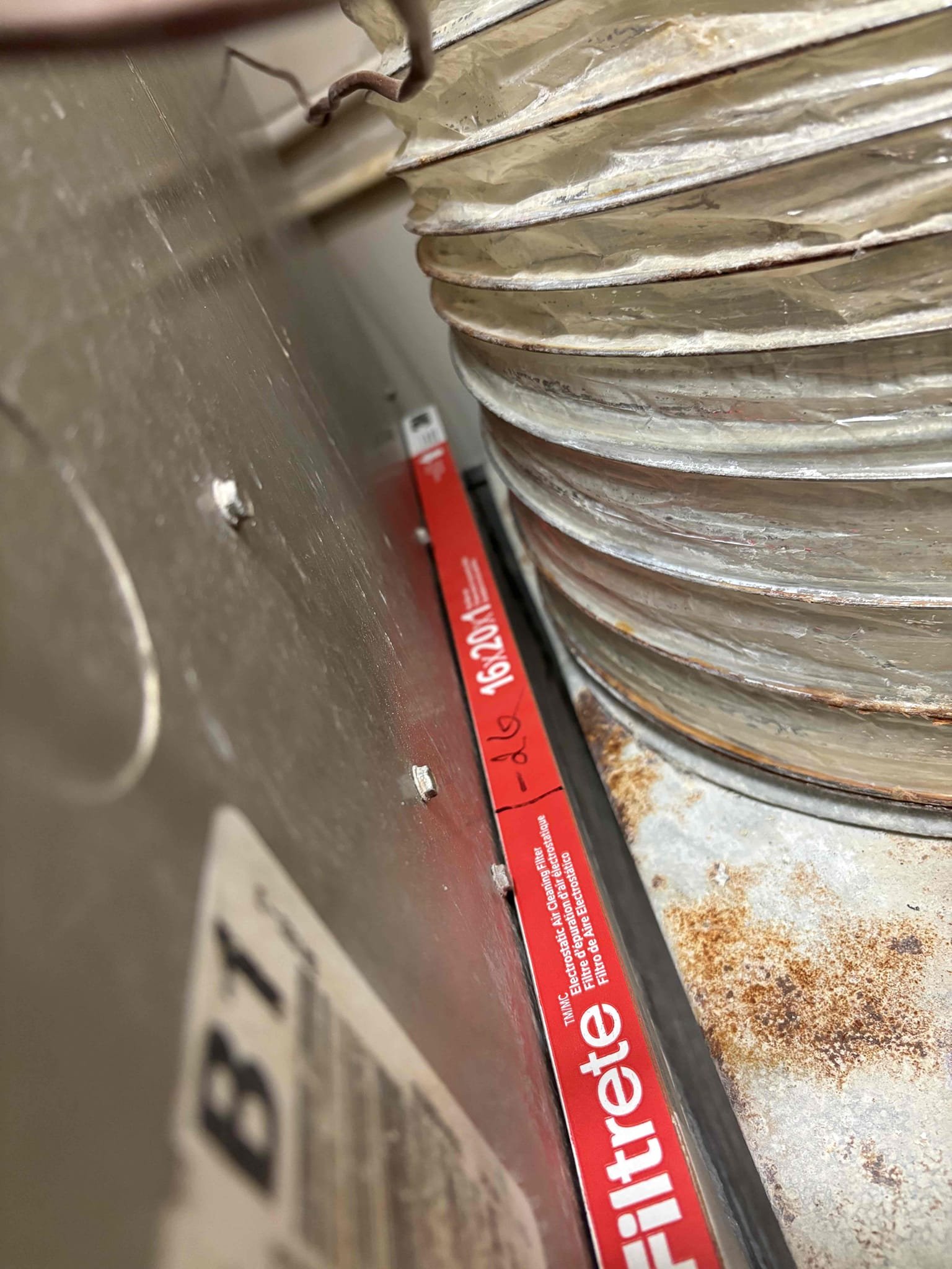 Upon arrival, I assessed the unit and identified a grinding noise originating from the inducer motor. After a thorough inspection, I confirmed that the system was operating correctly, but the noise was excessive. I took a CO2 reading in the supply duct in the bathroom, which showed 0 ppm, indicating proper ventilation. The flame sensor was dirty, so I cleaned it using sandpaper. Considering the unit's age and condition, I recommended a furnace replacement. I provided an estimate for the replacement and filled out a parts order form for a new inducer motor, although I did not recommend repairing it due to the unit's overall condition. I also applied a military discount to the replacement estimate.