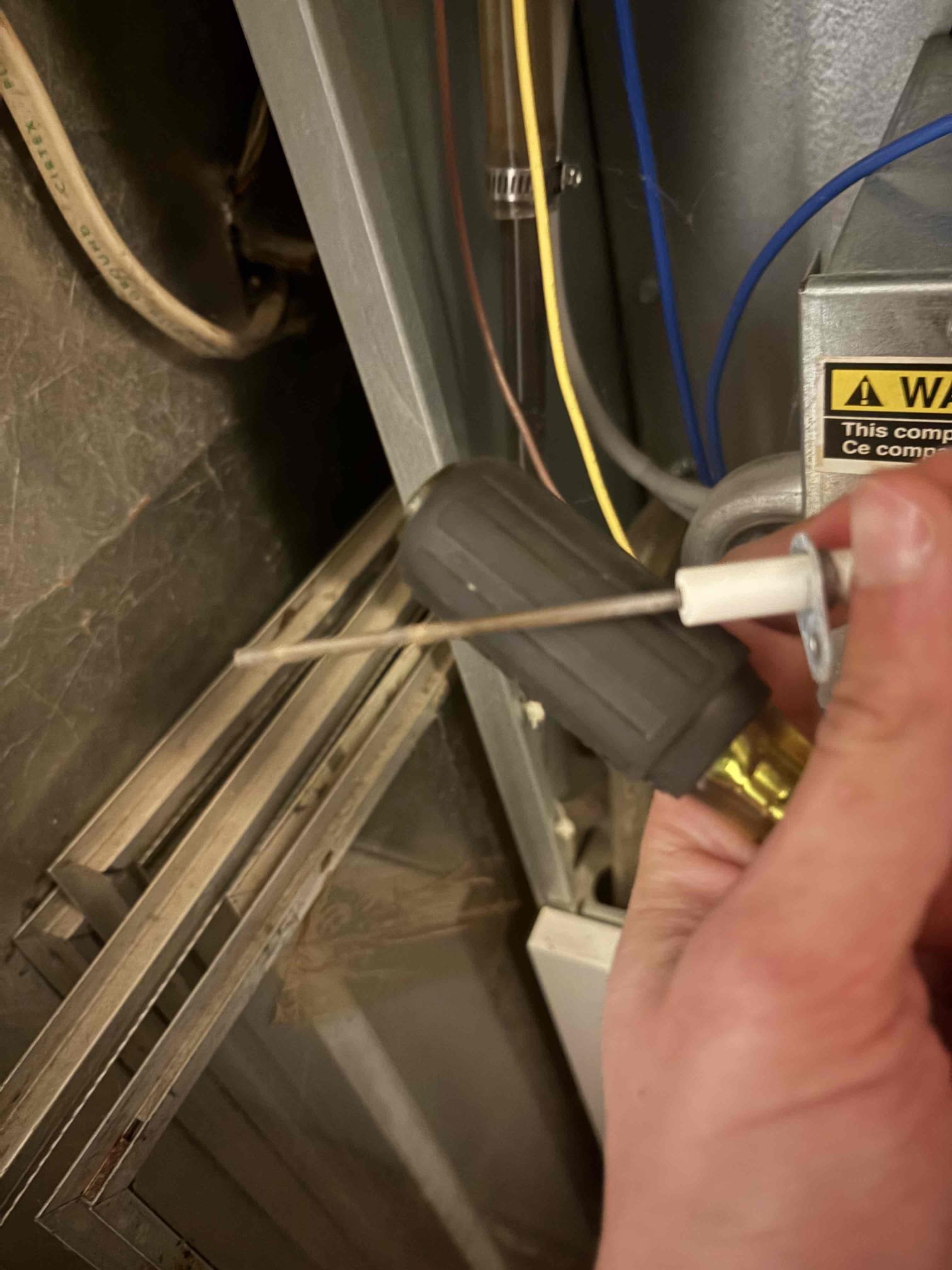 Upon inspection, the customer reported that the burner would ignite briefly before shutting off. I examined the system's operation and identified a dirty flame sensor as the issue. I carefully cleaned the flame sensor to remove any debris. Following the cleaning, I tested the unit, and it is now functioning correctly, ensuring efficient and reliable operation.