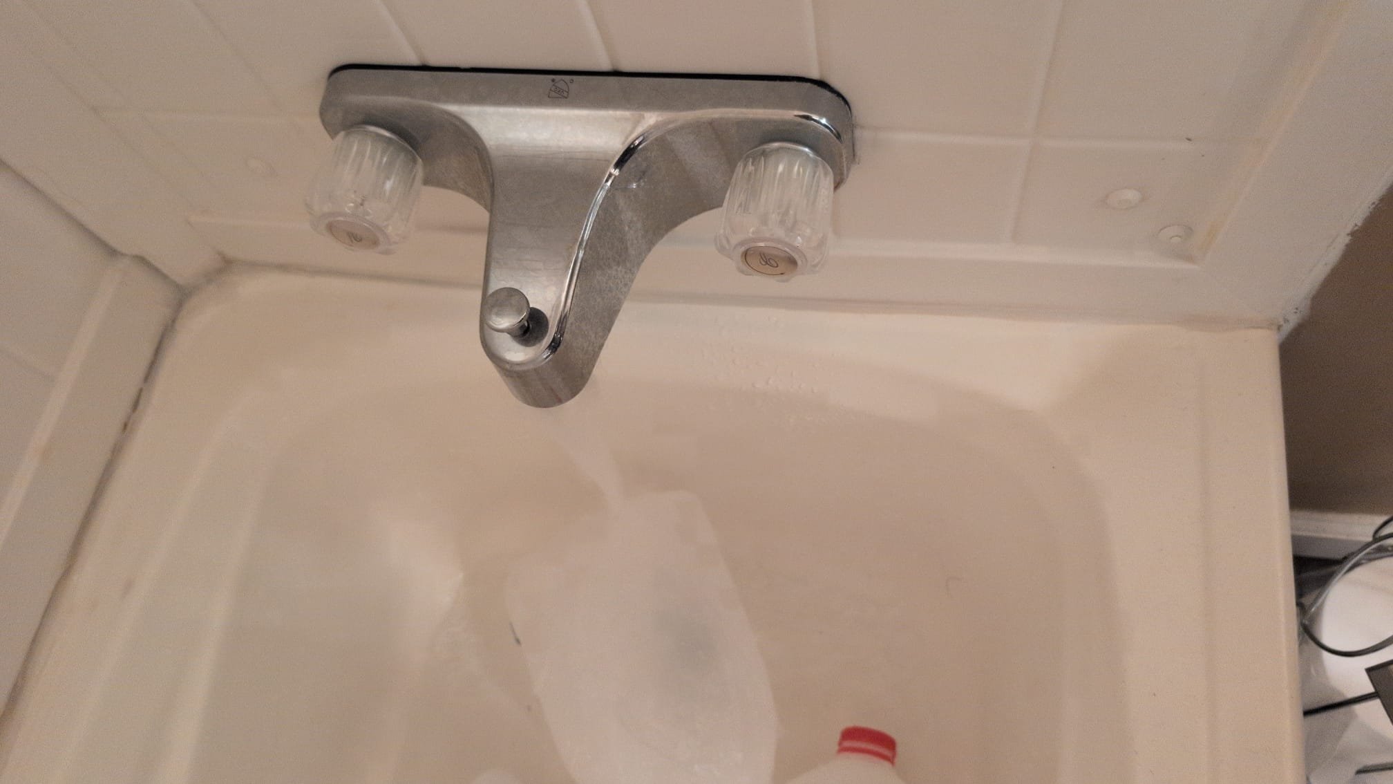 Upon arrival, we identified a frozen pipe issue affecting the entire trailer. The client reported adequate insulation beneath the structure. We conducted a thorough inspection to locate the frozen sections and assessed the extent of the damage. Using specialized tools, we safely thawed the pipes and ensured proper drainage to prevent future occurrences. We also provided recommendations for insulation improvements to enhance overall efficiency and comfort.